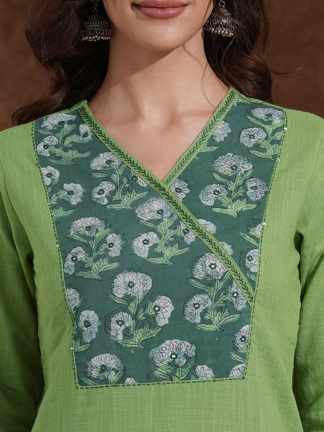 Straight fit kurta with Ajrakh overlap yoke and cuff with handwork highlight.