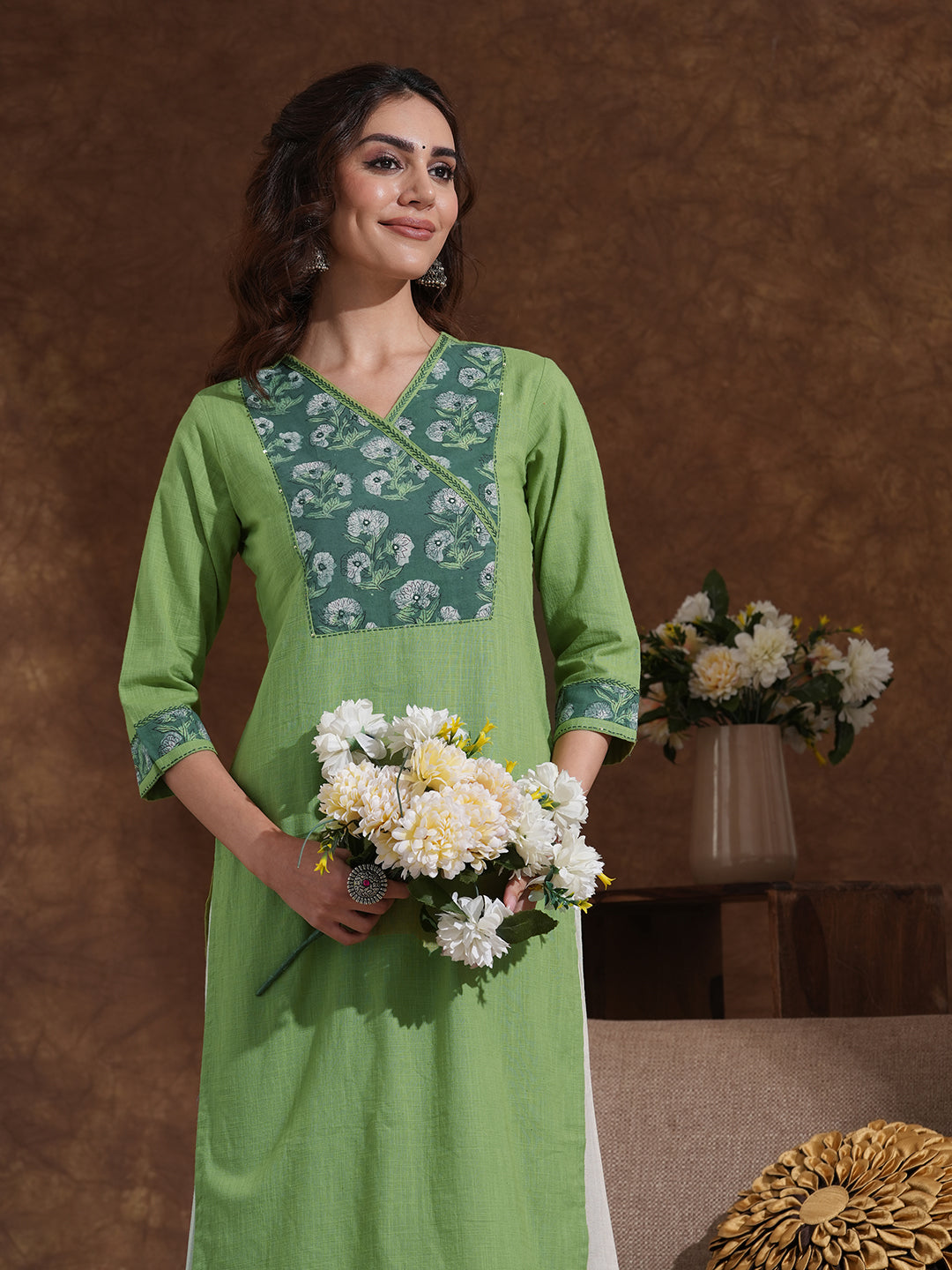 Straight fit kurta with Ajrakh overlap yoke and cuff with handwork highlight.