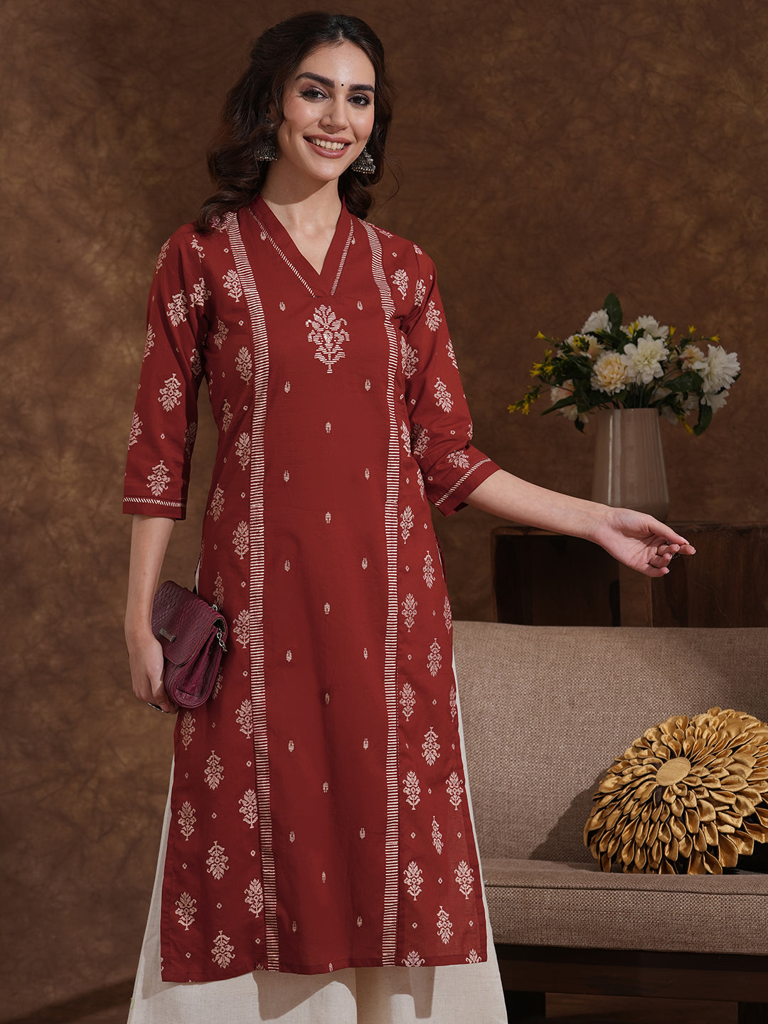 Straight fit shoulder princess kurta with block print on centre panel and sleeves.