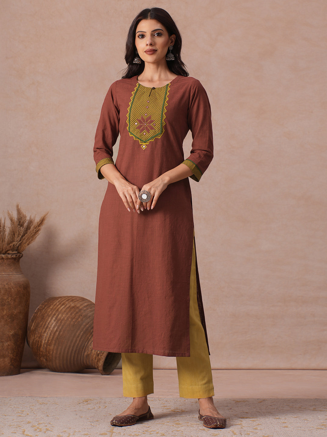 Cotton Straight Fit Kurta with Machine Applique and Contrast Fabric Sleeve Trims.