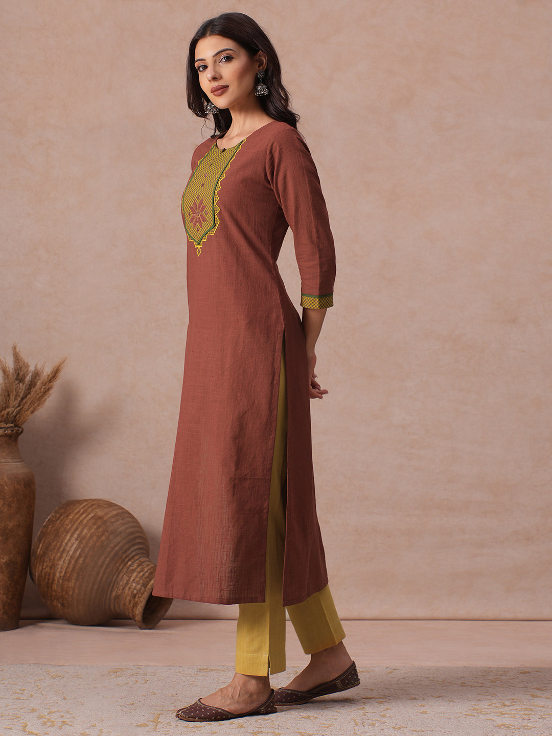 Cotton Straight Fit Kurta with Machine Applique and Contrast Fabric Sleeve Trims.