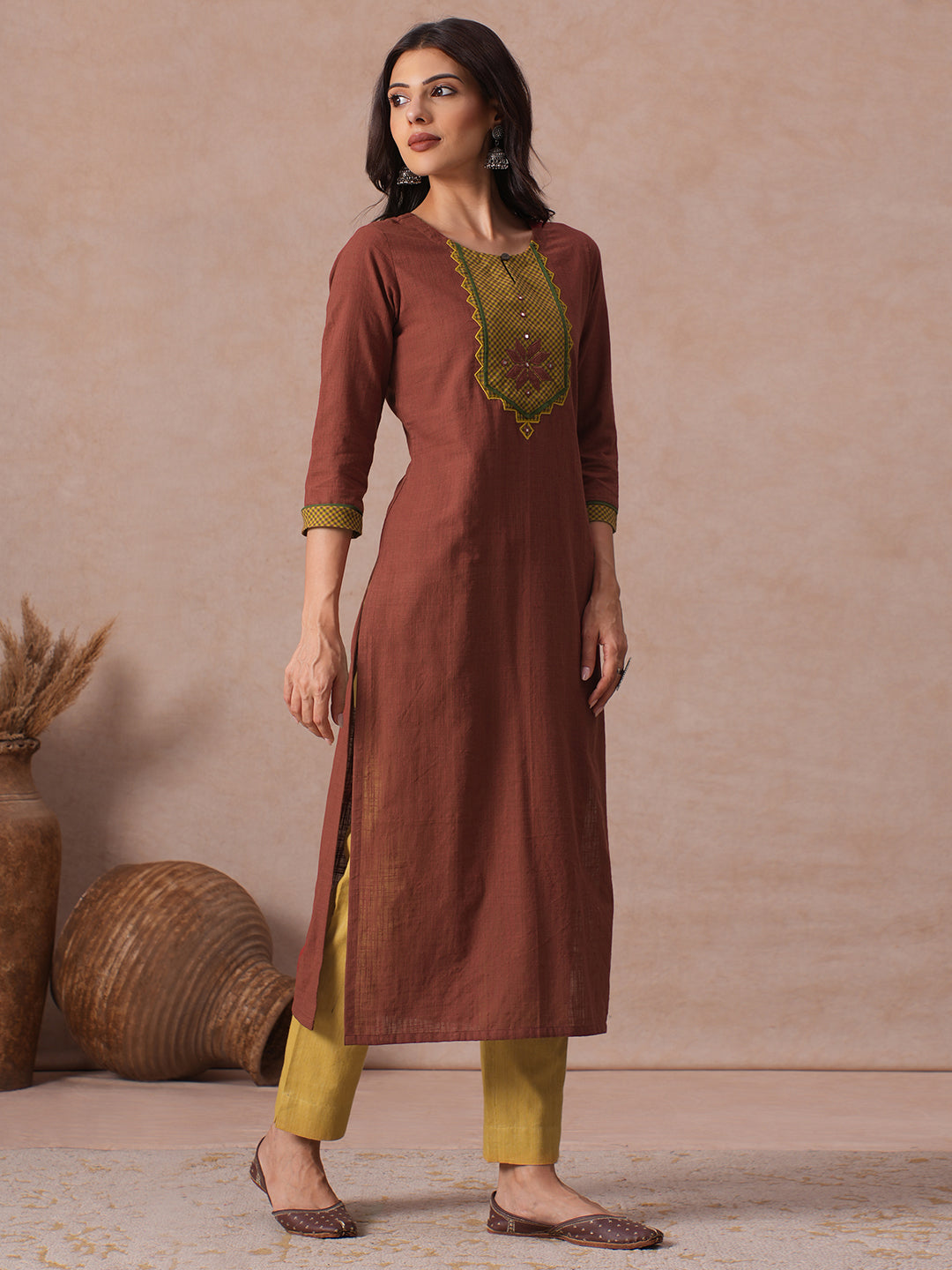Cotton Straight Fit Kurta with Machine Applique and Contrast Fabric Sleeve Trims.