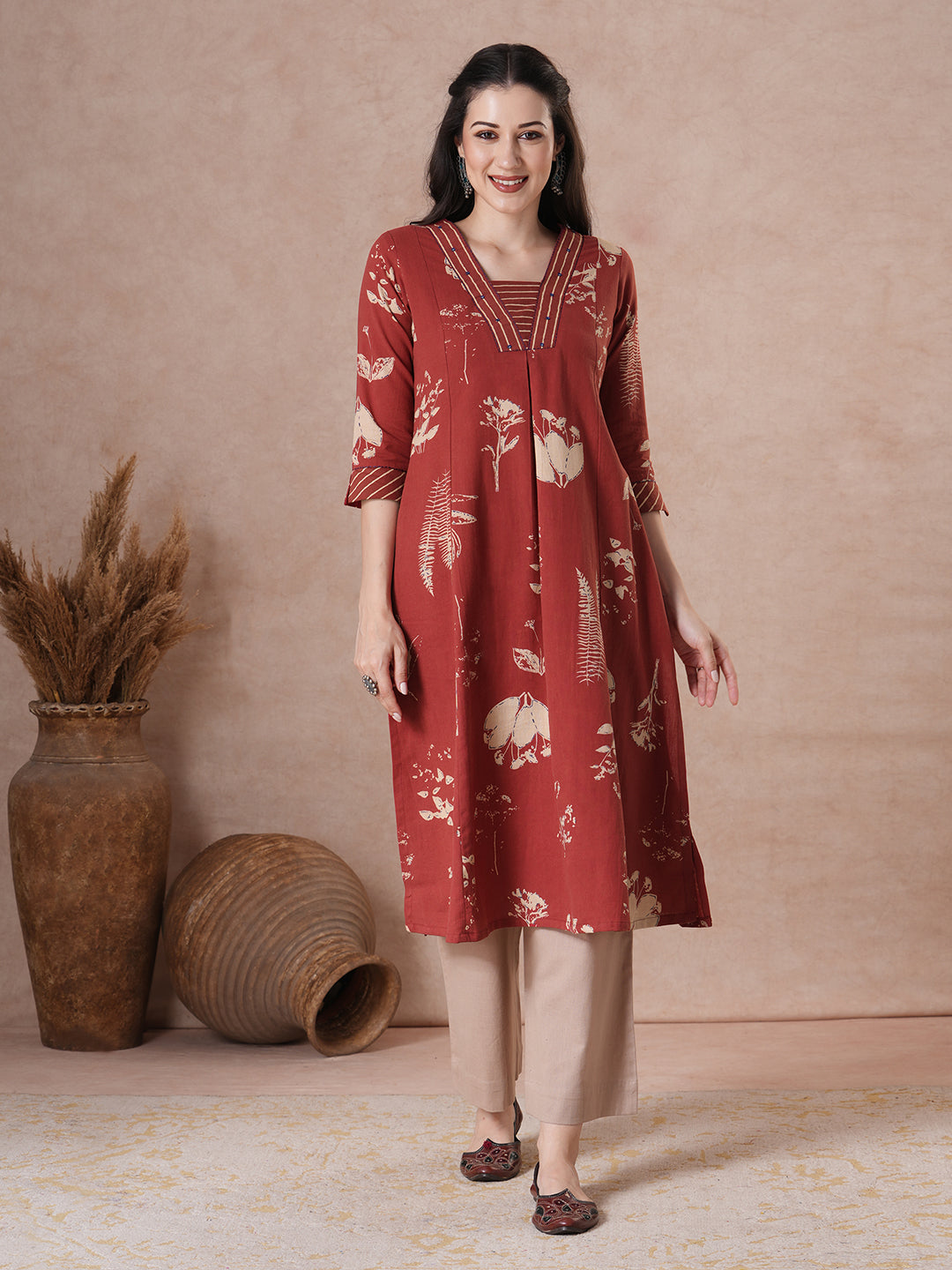 Botanical Print A-Line Kurta with Striped Trim & Handwork Detail.
