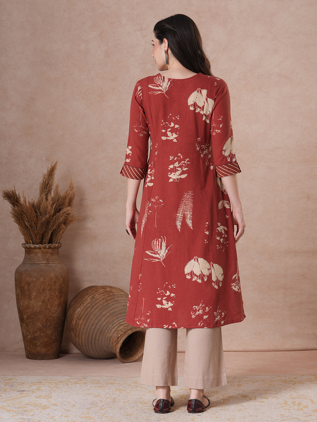 Botanical Print A-Line Kurta with Striped Trim & Handwork Detail.