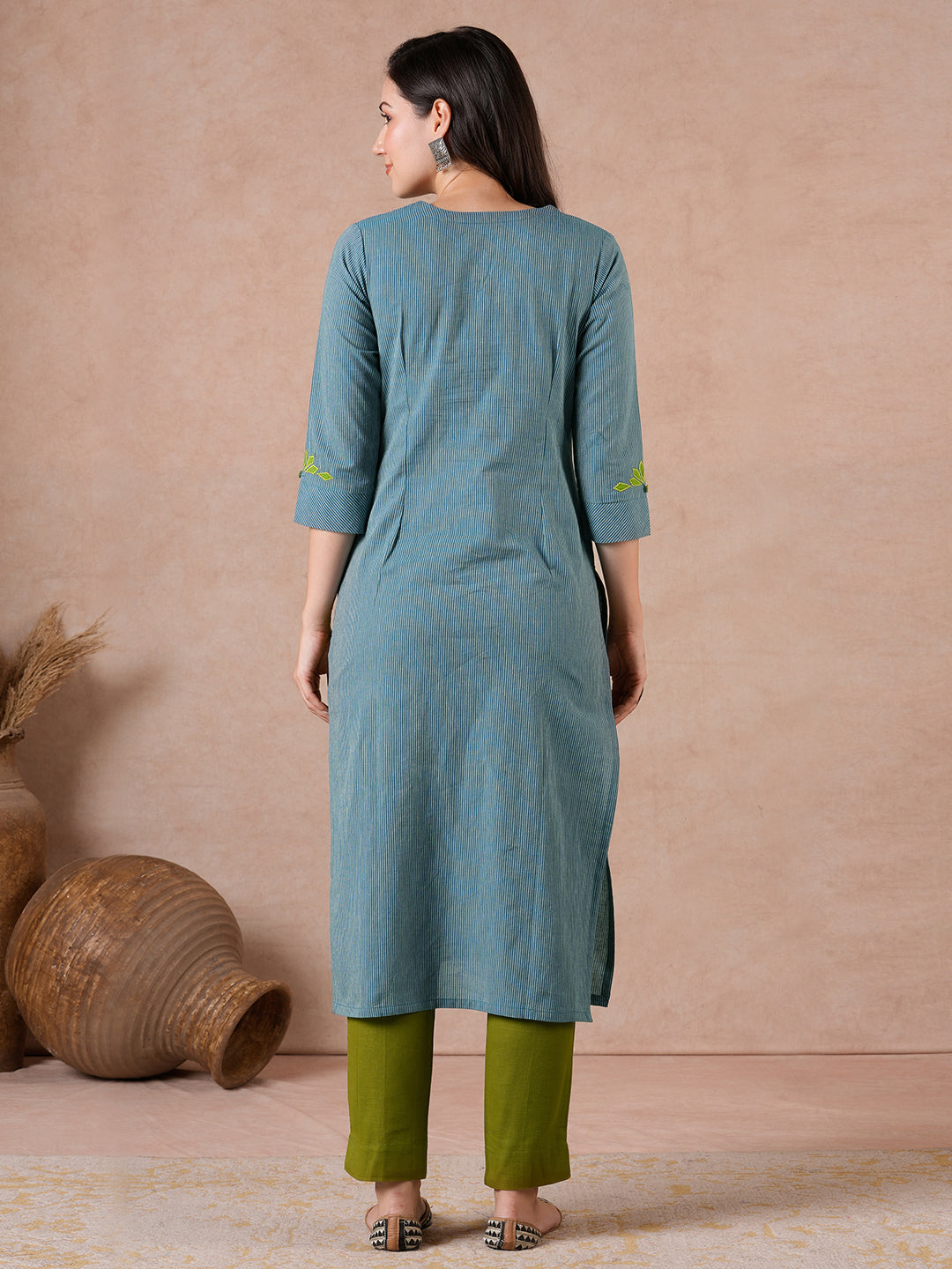 Straight Fit Cotton Kurta with Bias Yoke & Geometric Applique Detail.