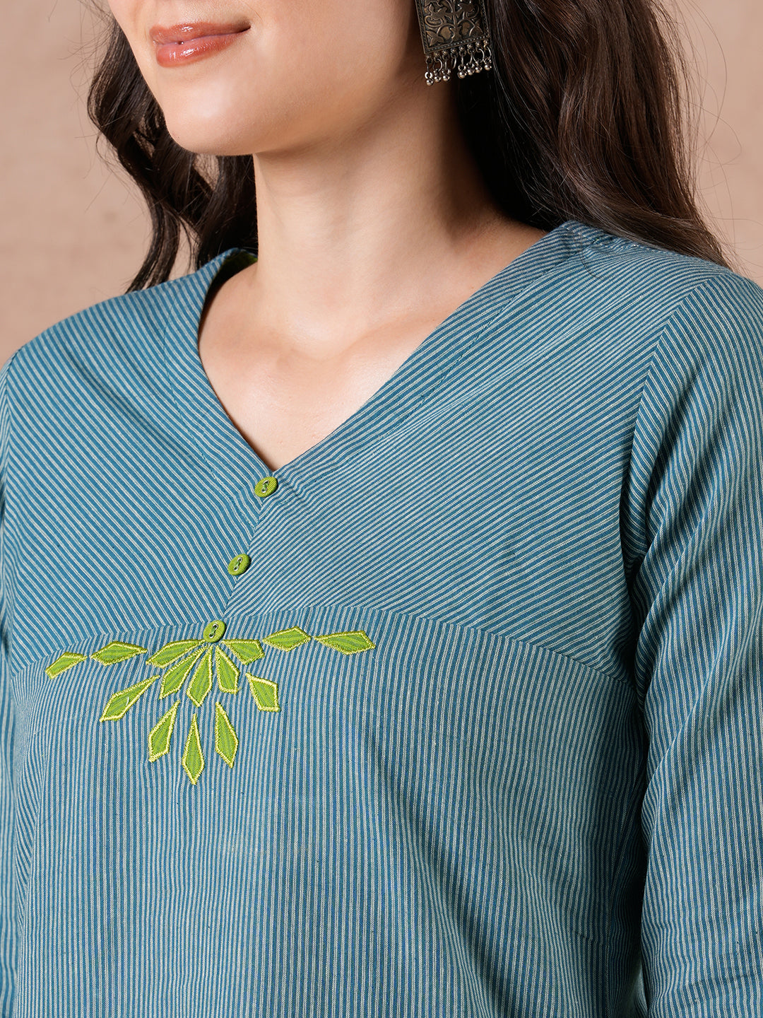 Straight Fit Cotton Kurta with Bias Yoke & Geometric Applique Detail.