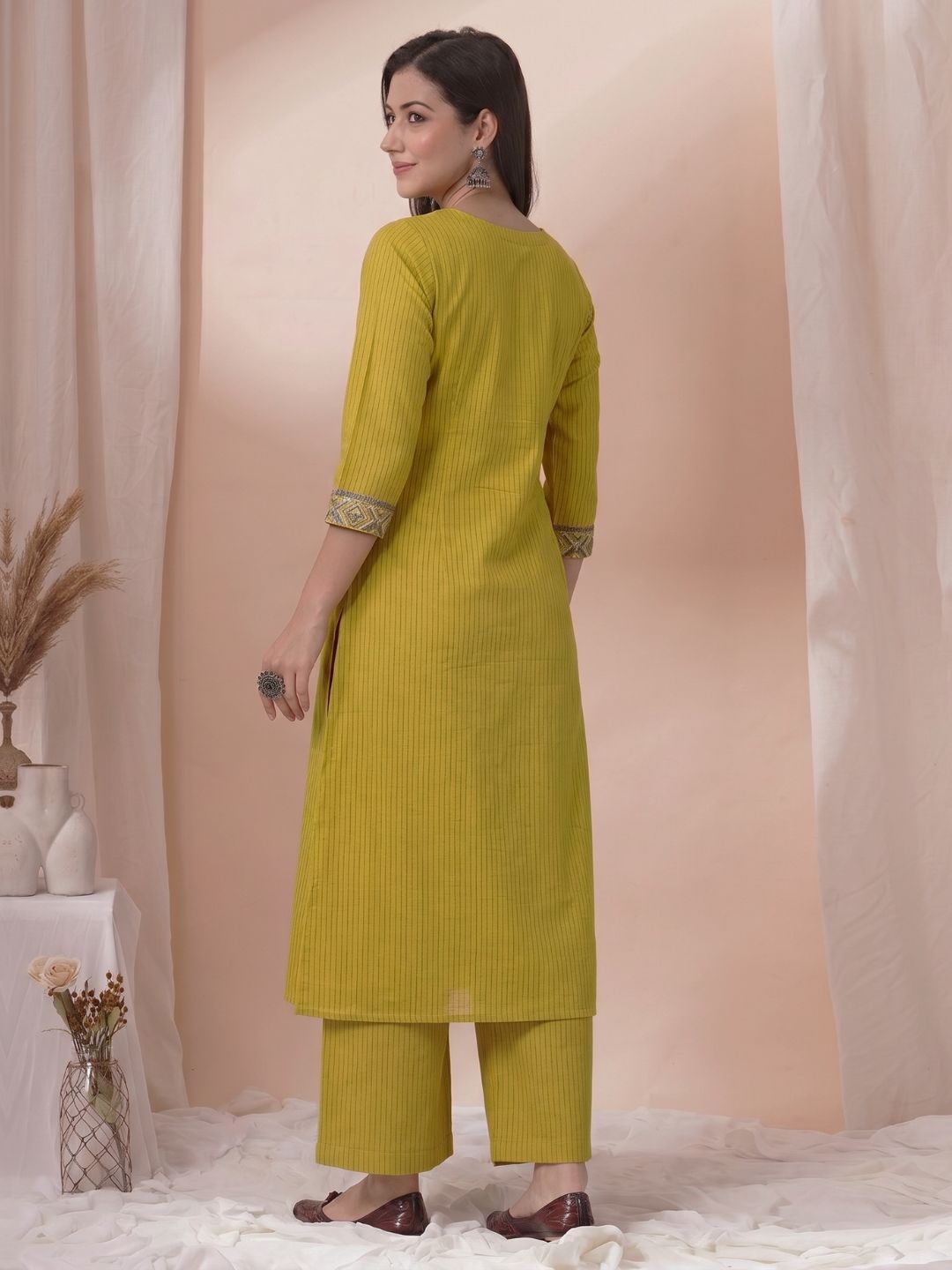 Straight Fit Cotton Striped Kurta with Kalamkari Applique & Piping Details.