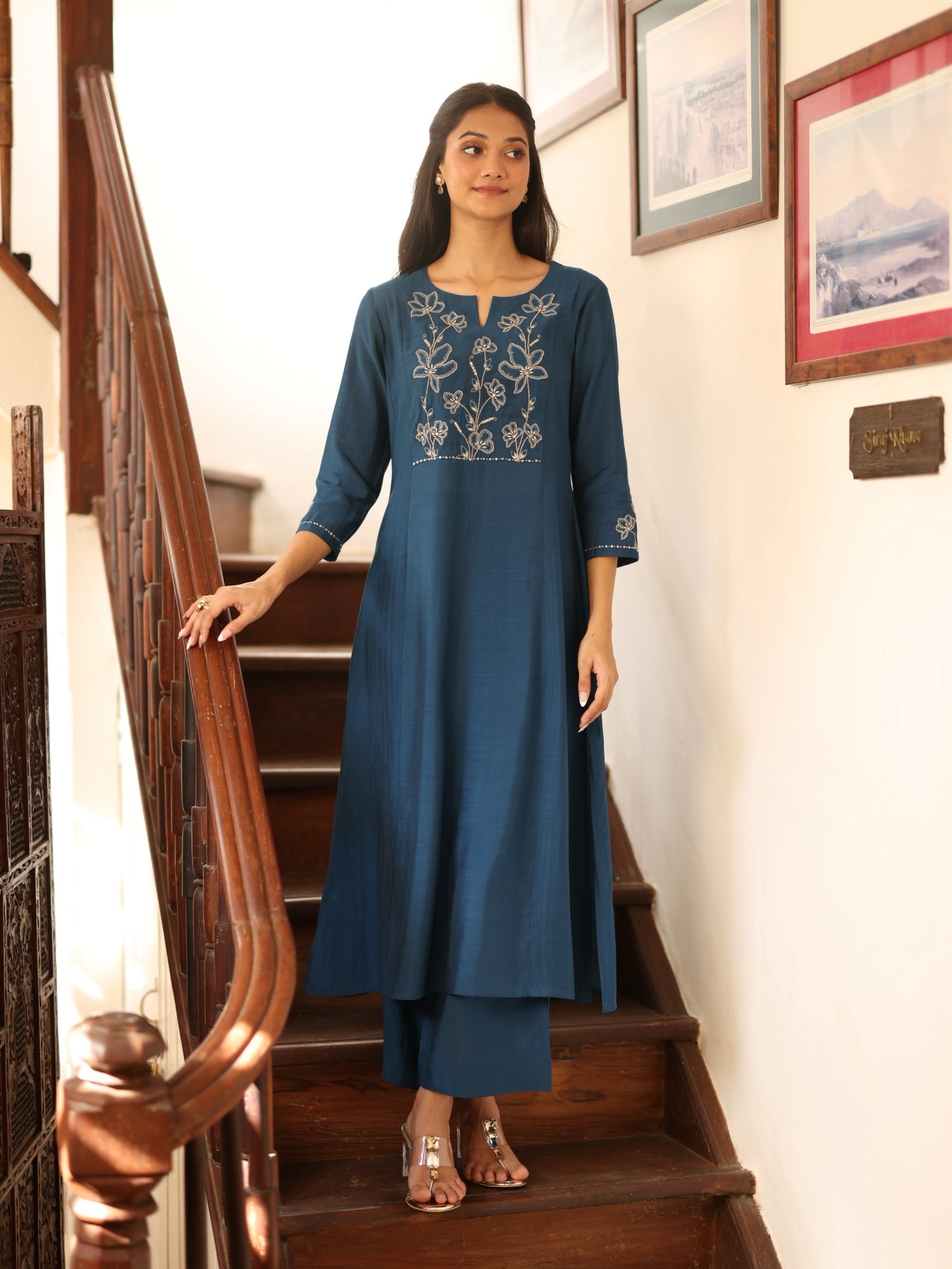 A-line kurta in silk blend fabric with Zari and thread embroidery paired with lined palazzo