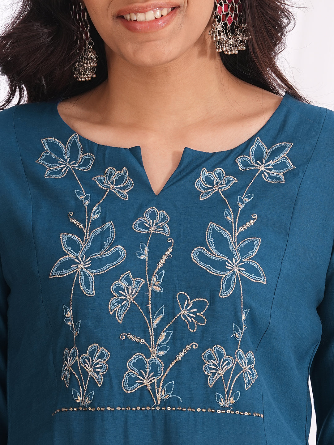 A-line kurta in silk blend fabric with Zari and thread embroidery paired with lined palazzo
