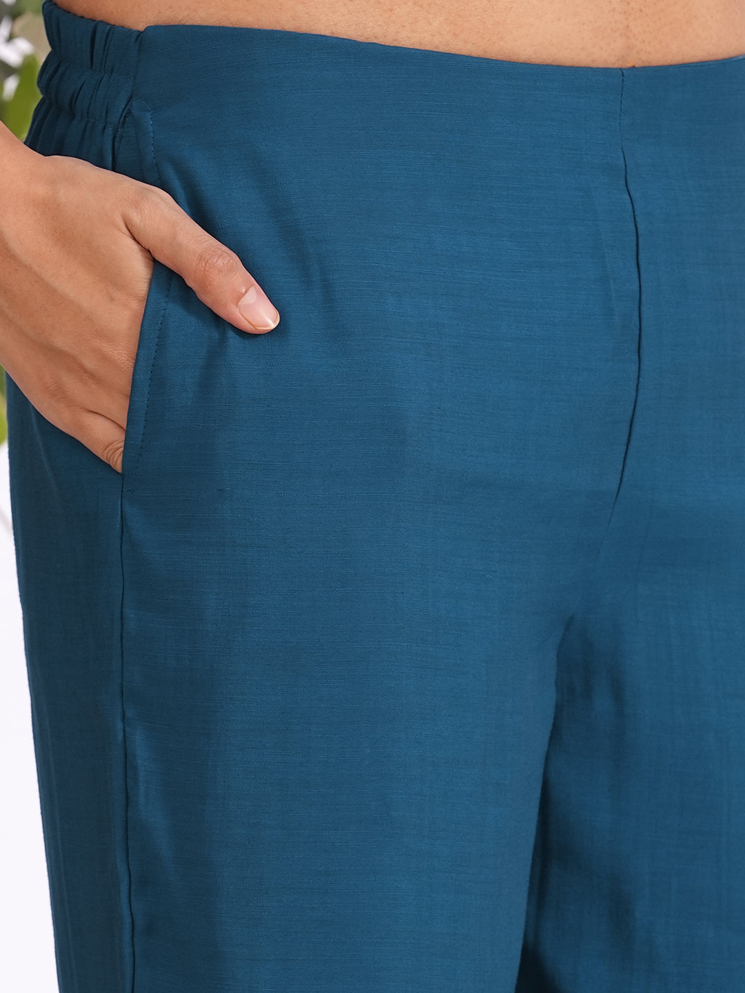 A-line kurta in silk blend fabric with Zari and thread embroidery paired with lined palazzo