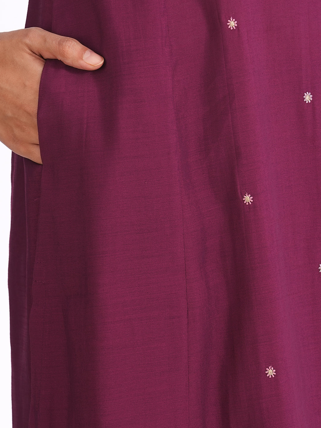 A-line kurta in silk blend fabric with thread and Zari embroidery paired with lined art silk palazzo