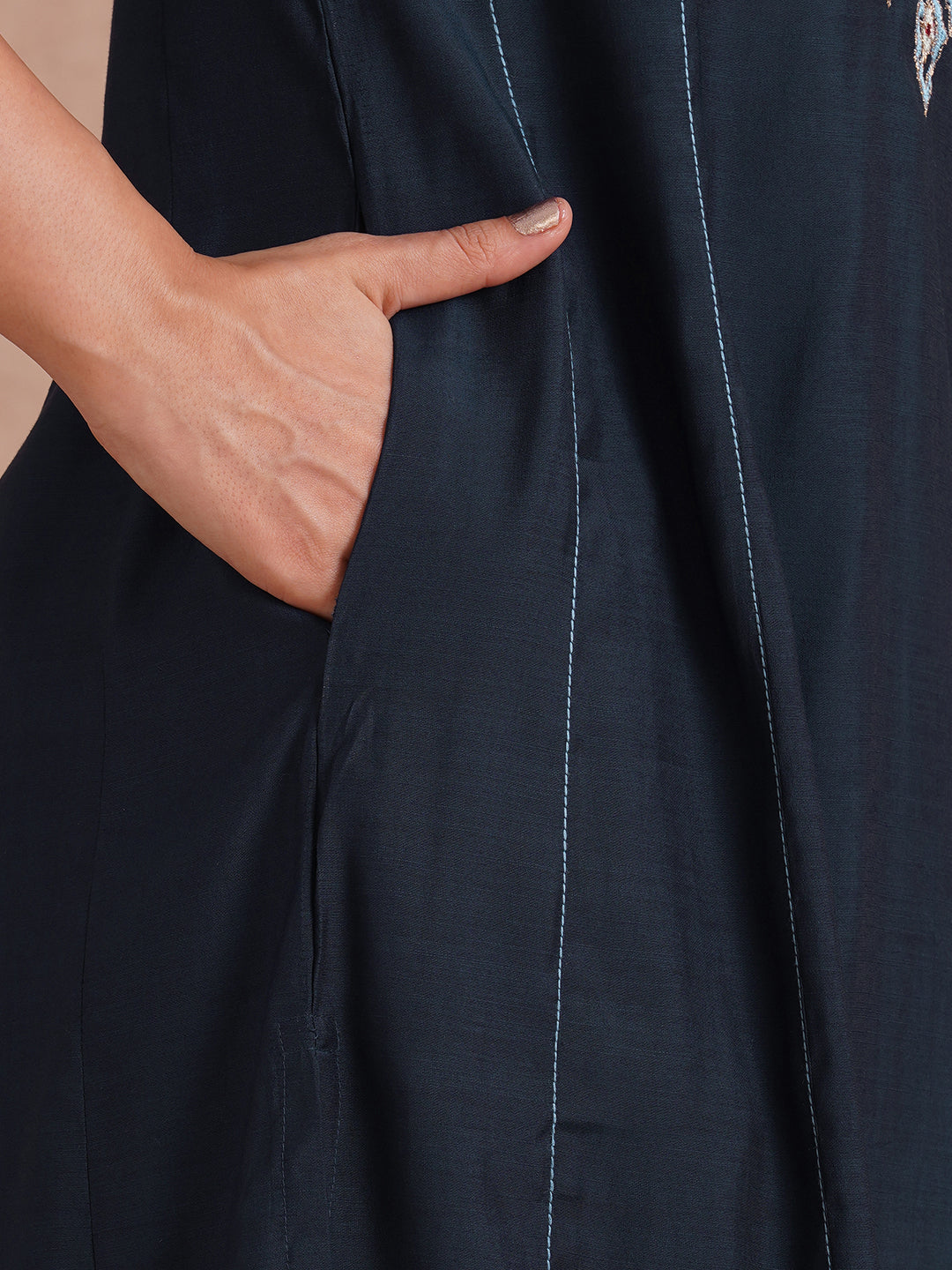 Party Edit- Pocketed and embroidered kurta in art silk fabric paired with lined art silk palazzo.