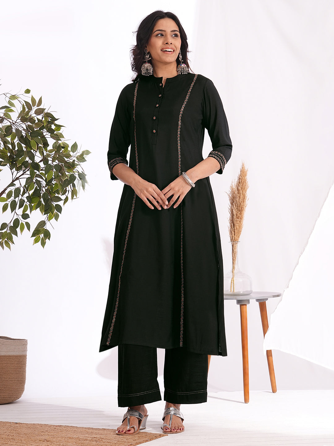 A-line embroidered silk blend kurta set paired with lined palazzo
