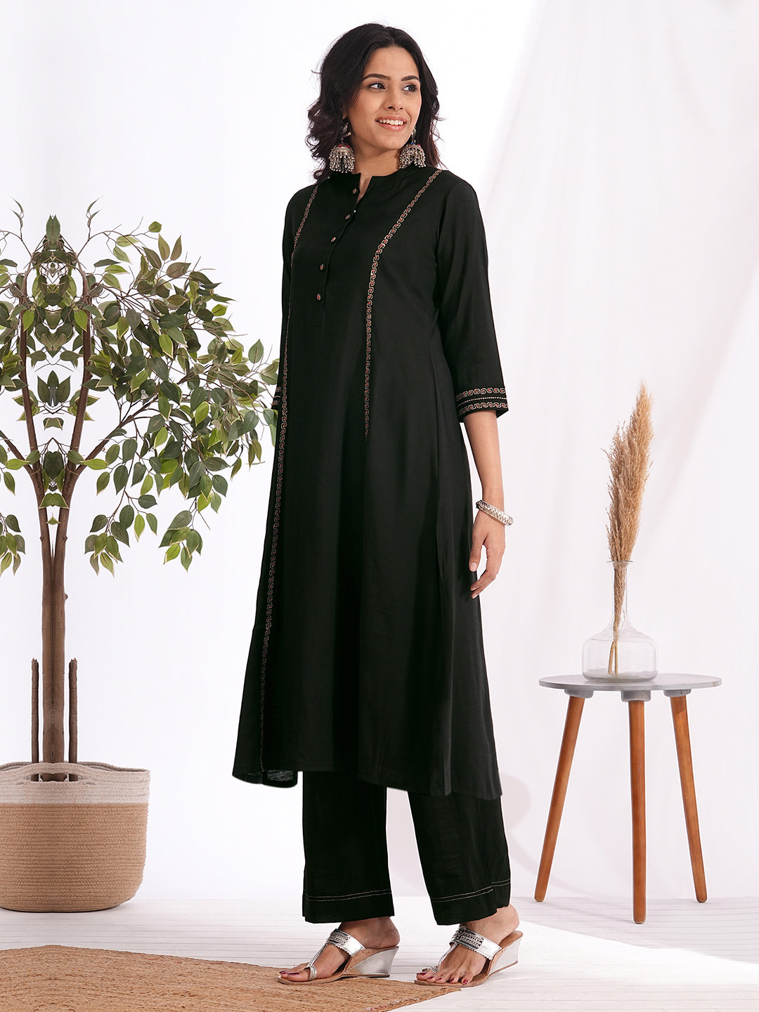 A-line embroidered silk blend kurta set paired with lined palazzo
