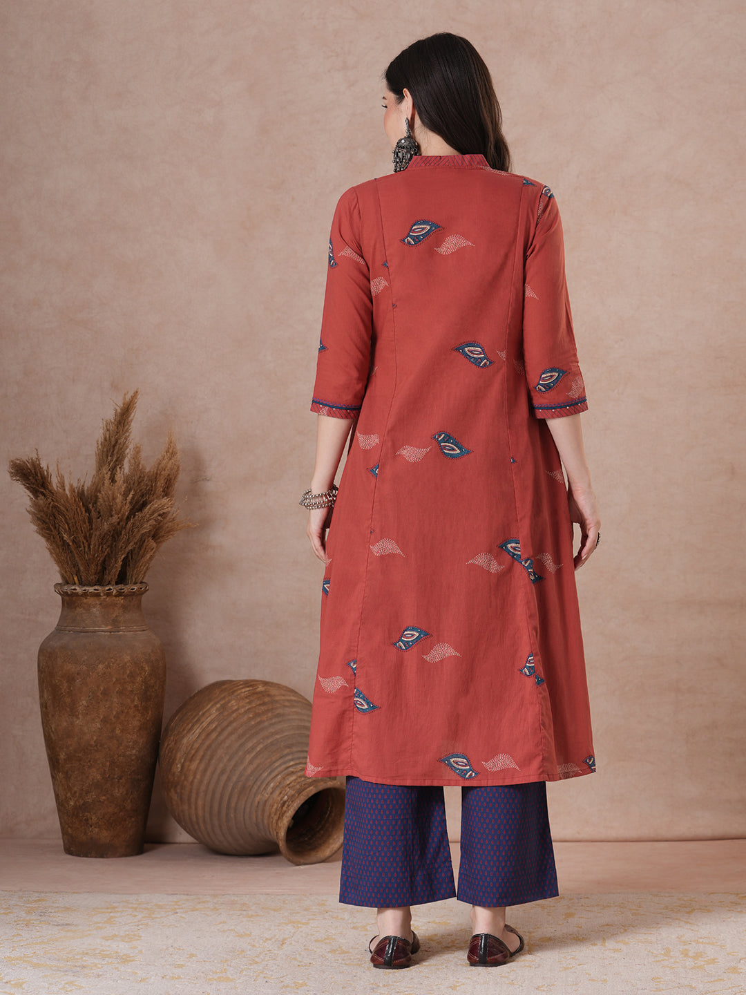 Red abstract printed A-Line Kurta Palazzo Set.