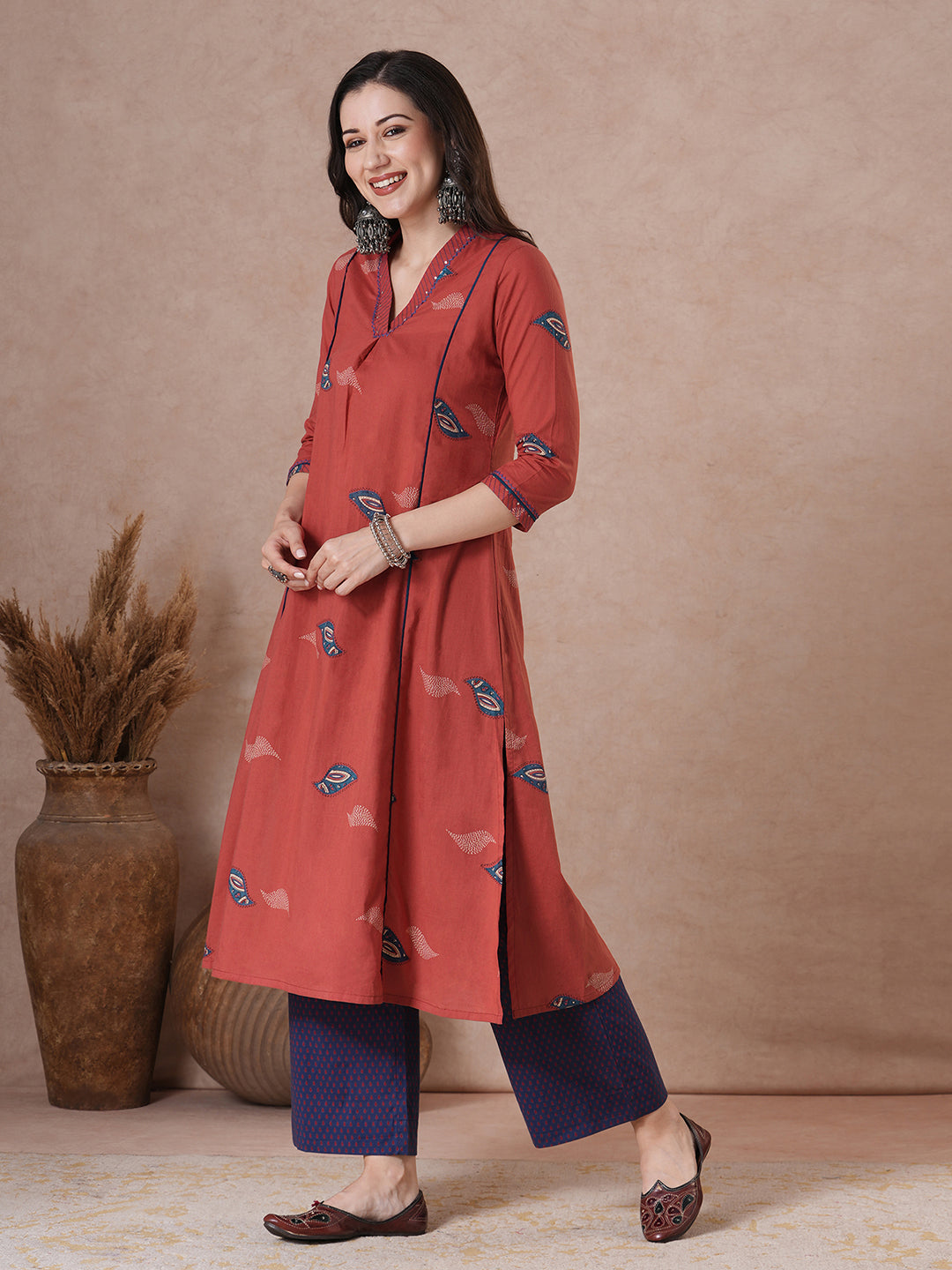 Red abstract printed A-Line Kurta Palazzo Set.