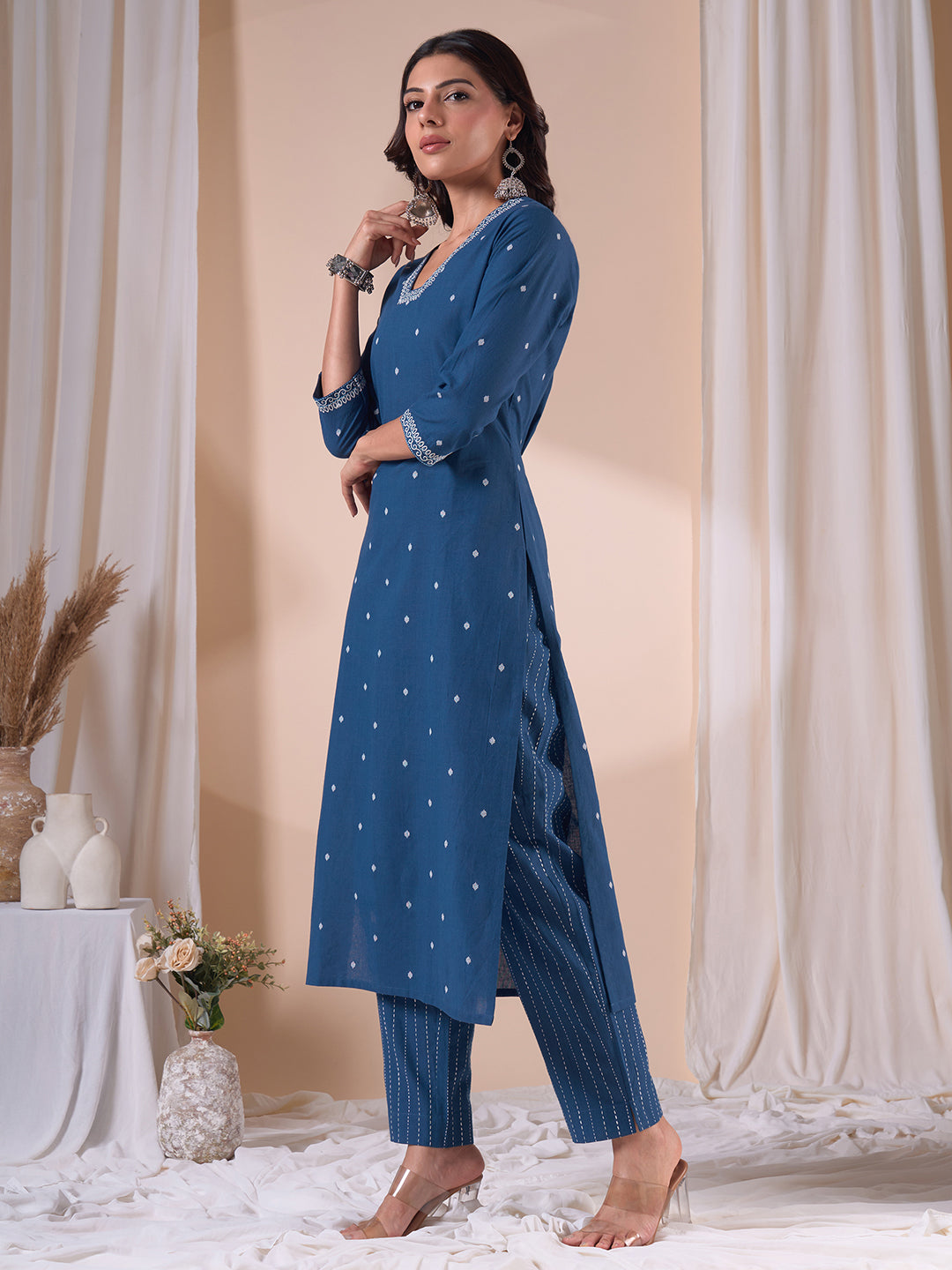 Cotton Dobby Straight Kurta Set with Resham Embroidery and Striped Kantha Pants.
