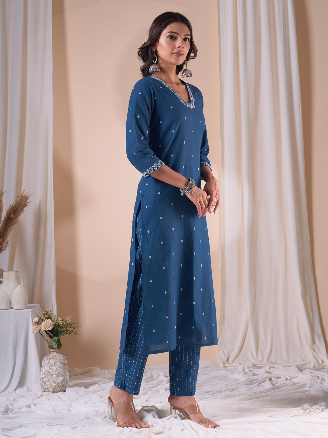 Cotton Dobby Straight Kurta Set with Resham Embroidery and Striped Kantha Pants.