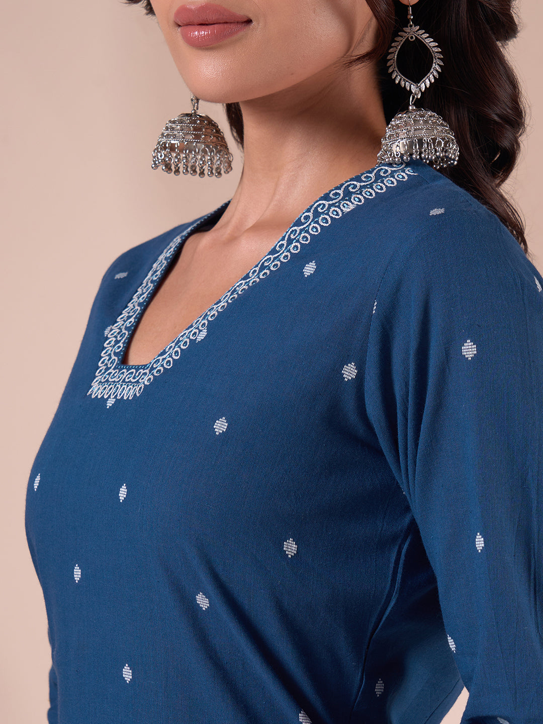 Cotton Dobby Straight Kurta Set with Resham Embroidery and Striped Kantha Pants.
