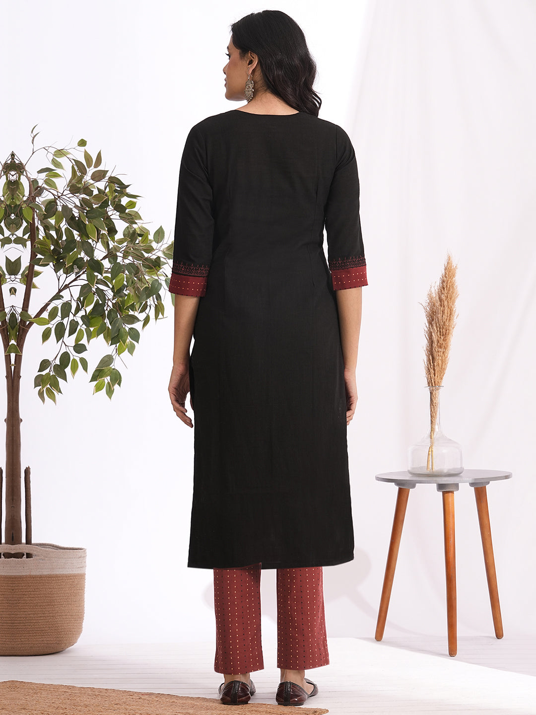 Straight fit kurta set with Yoke and sleeves highlighted with block print and handwork