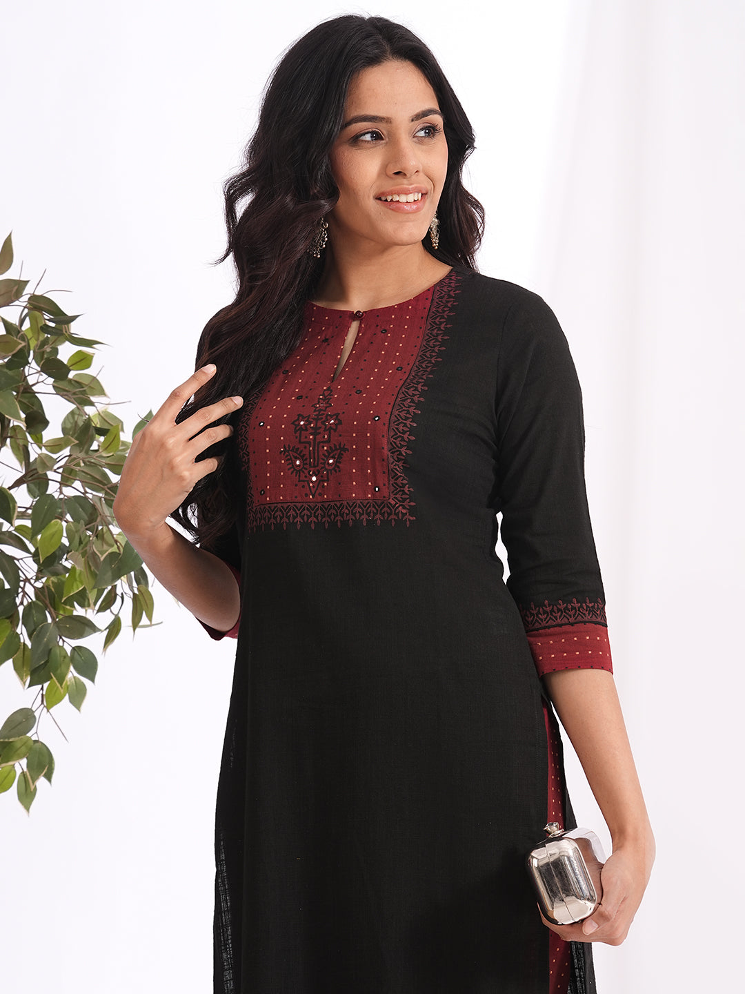 Straight fit kurta set with Yoke and sleeves highlighted with block print and handwork