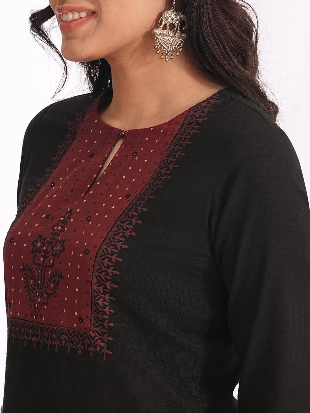 Straight fit kurta set with Yoke and sleeves highlighted with block print and handwork