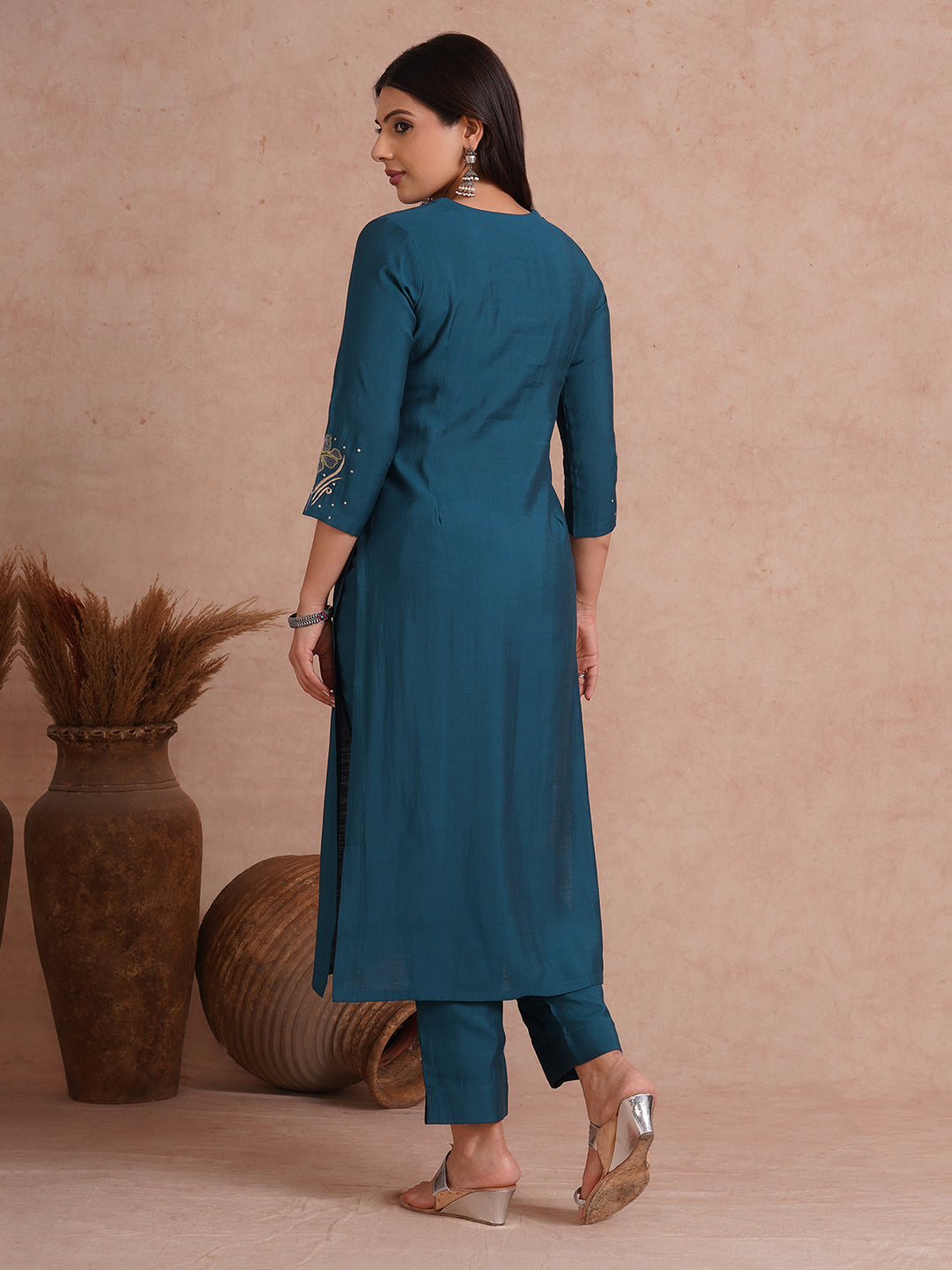 Party Edit- Straight fit kurta set with placement embroidery and handwork paired with lined pants.