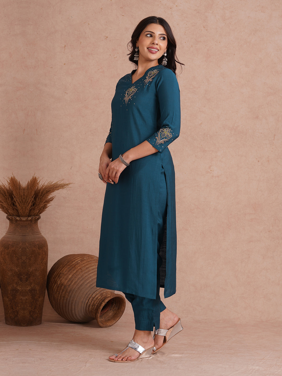 Party Edit- Straight fit kurta set with placement embroidery and handwork paired with lined pants.