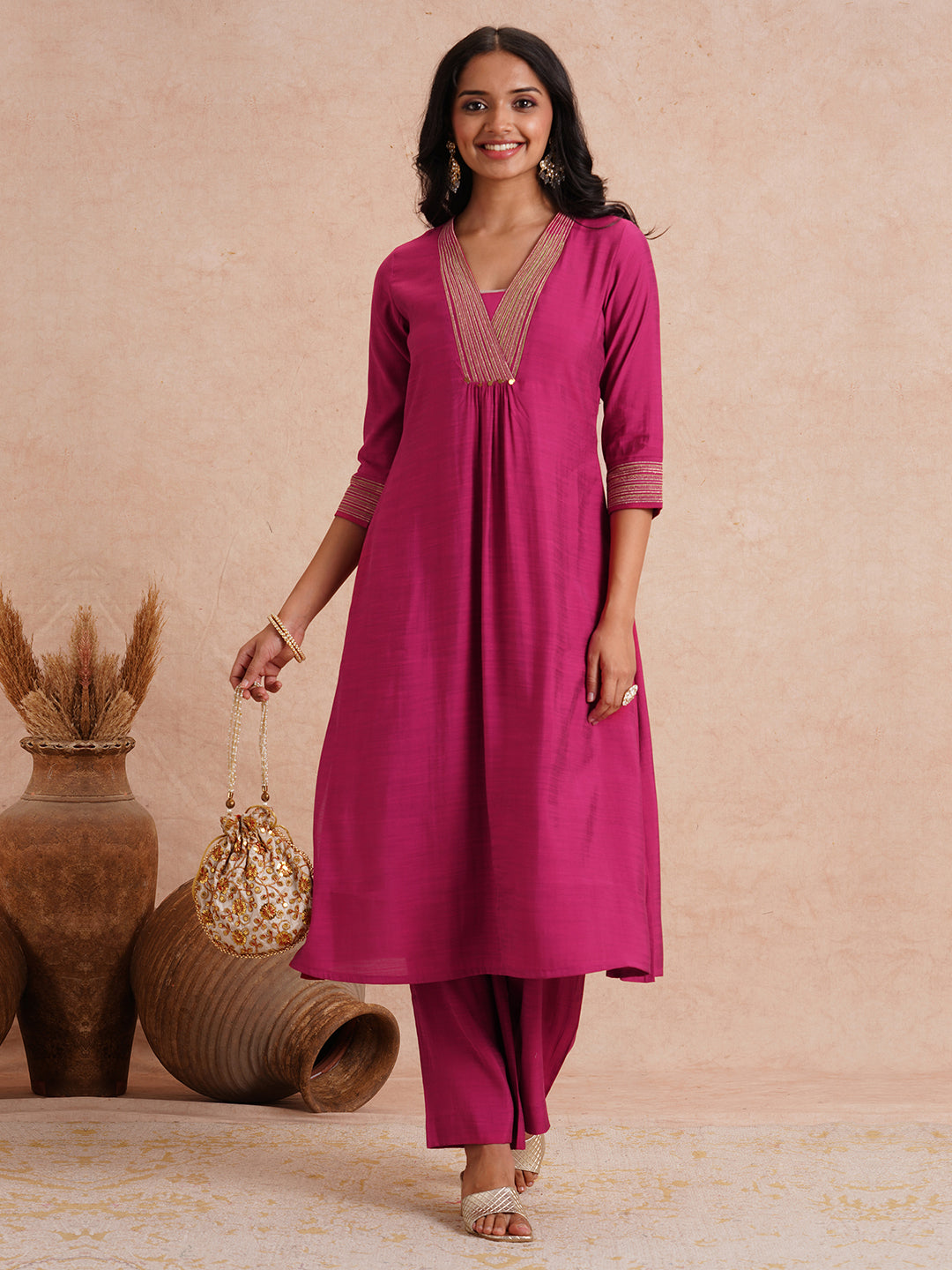 Party Edit- Flared kurta set with embroidered neck and cuff paired with palazzo.