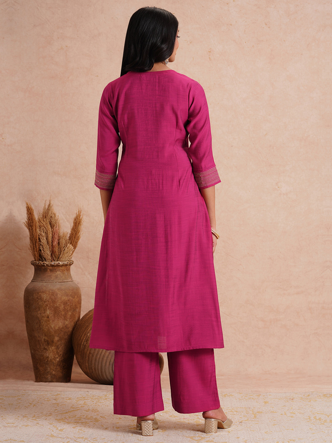 Party Edit- Flared kurta set with embroidered neck and cuff paired with palazzo.