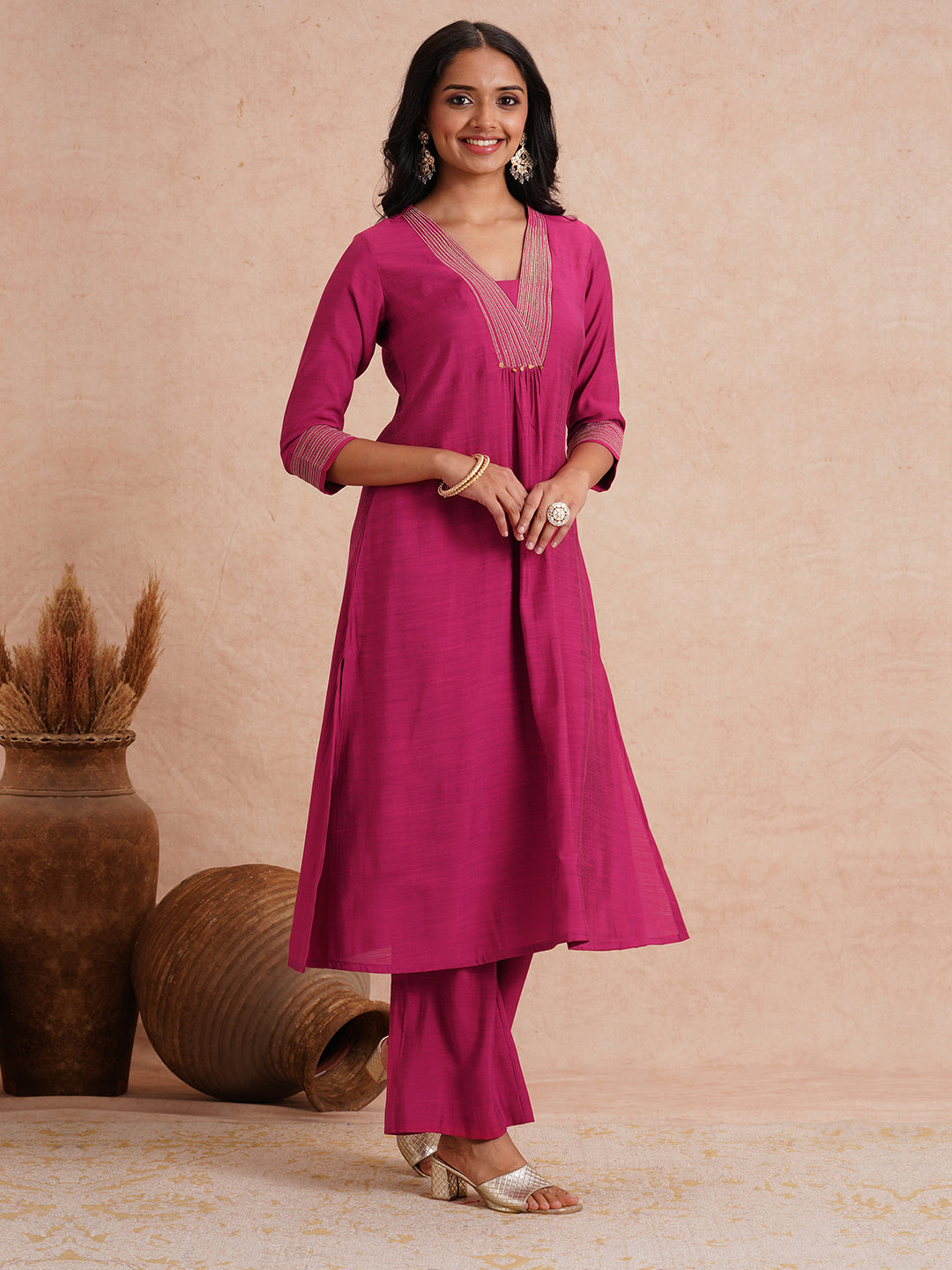 Party Edit- Flared kurta set with embroidered neck and cuff paired with palazzo.