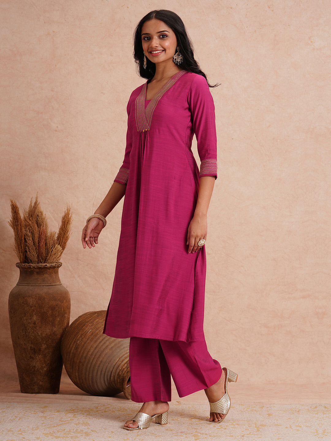 Party Edit- Flared kurta set with embroidered neck and cuff paired with palazzo.