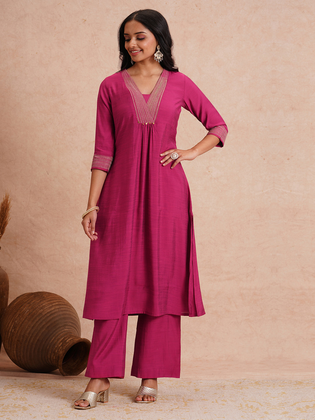 Party Edit- Flared kurta set with embroidered neck and cuff paired with palazzo.