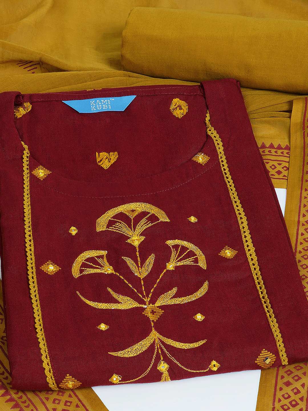 3-piece kurta set featuring a dobby kurta adorned with delicate embroidery and lace detailing.(Red)