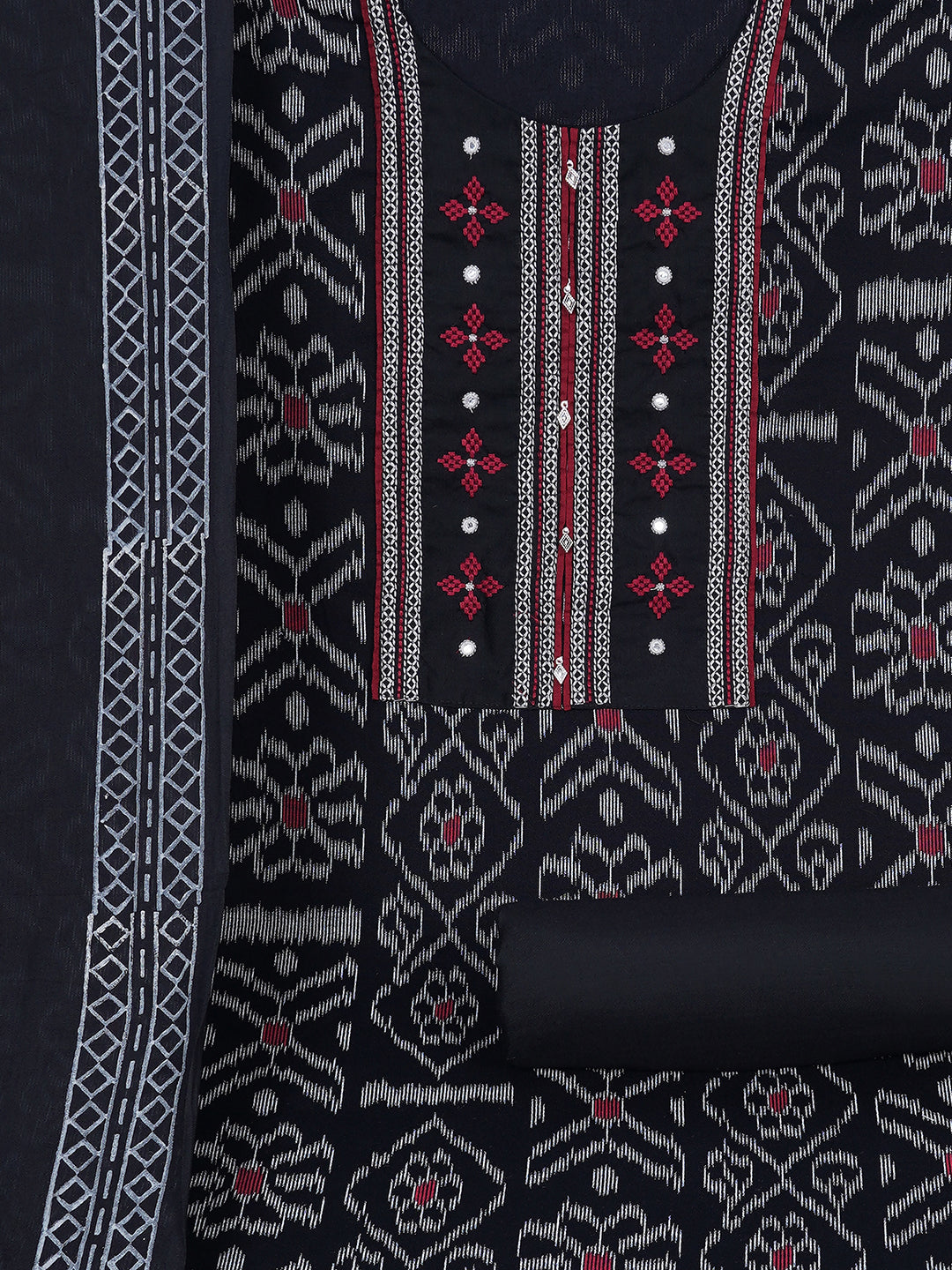 Cotton Ikat embroidered suit set with plain bottom and printed dupatta.