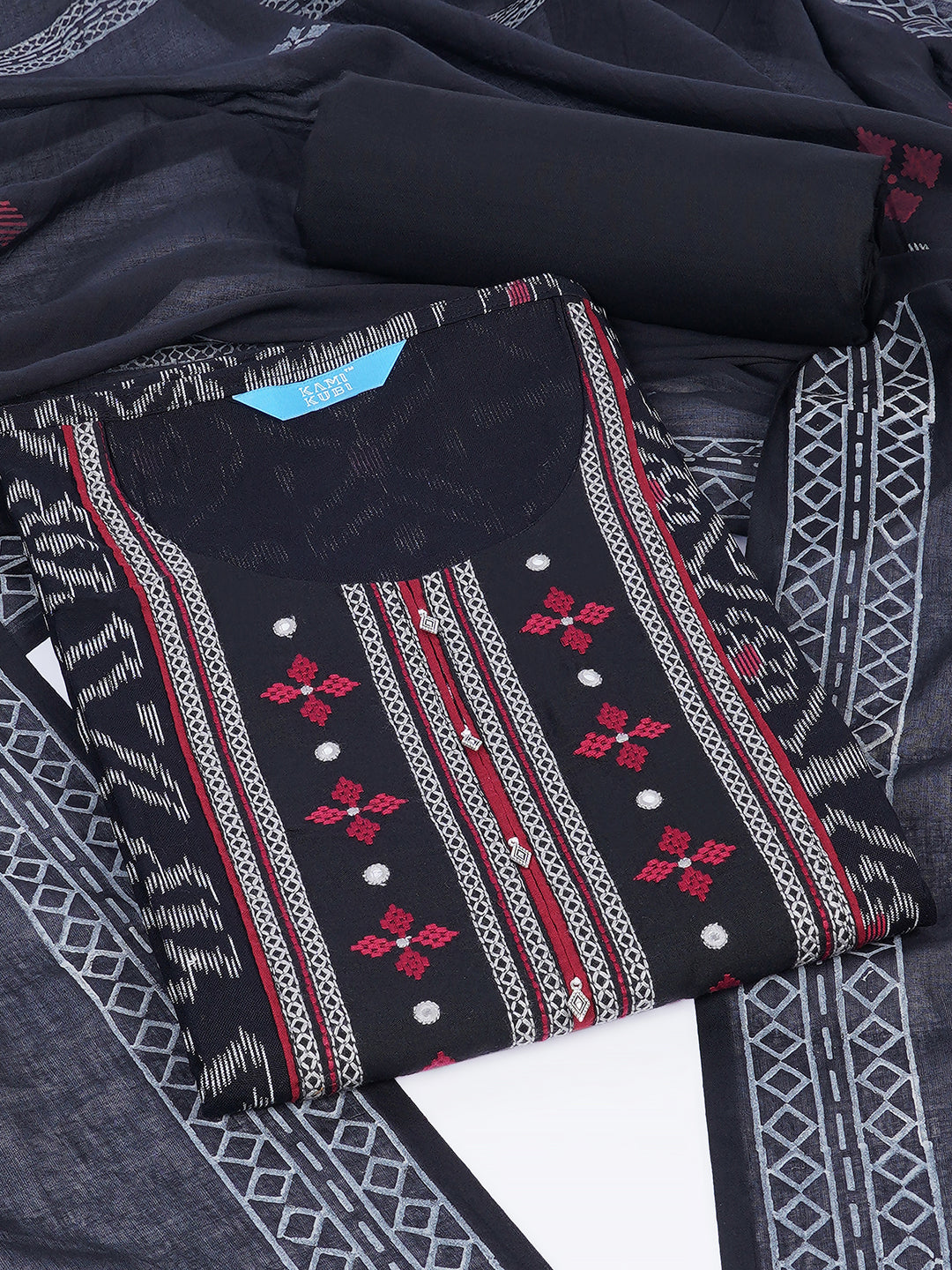 Cotton Ikat embroidered suit set with plain bottom and printed dupatta.