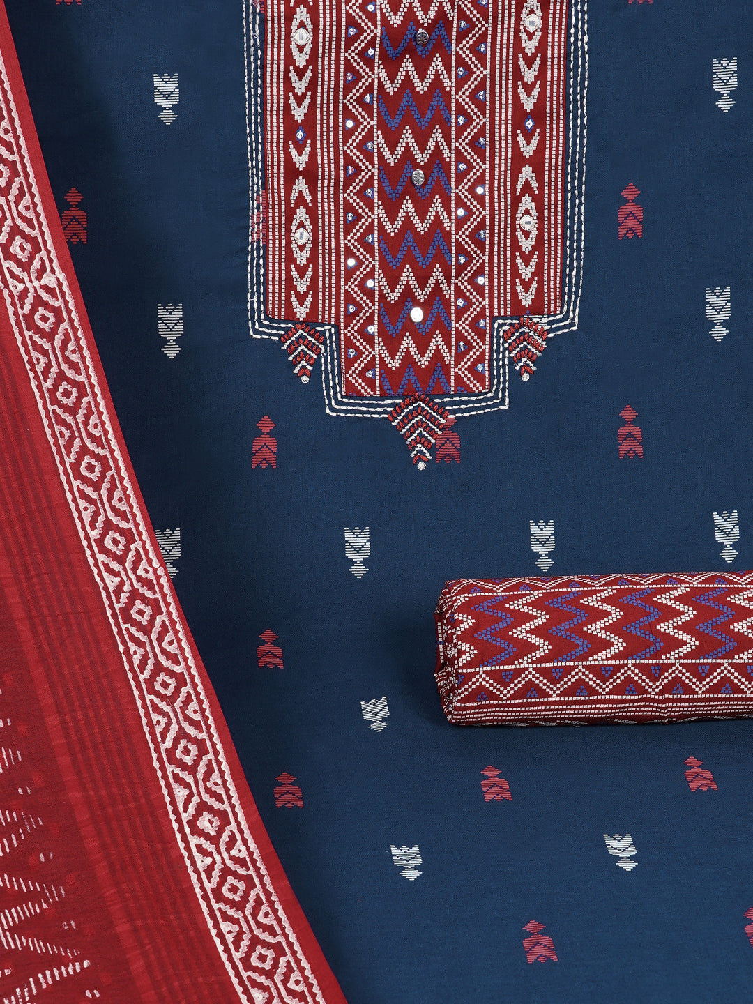 3-piece unstitched suit set featuring a butti-printed kurta with coordinated yoke detailing.