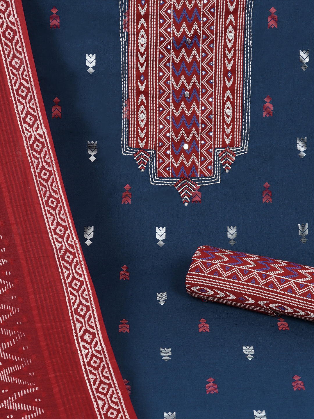 3-piece unstitched suit set featuring a butti-printed kurta with coordinated yoke detailing.