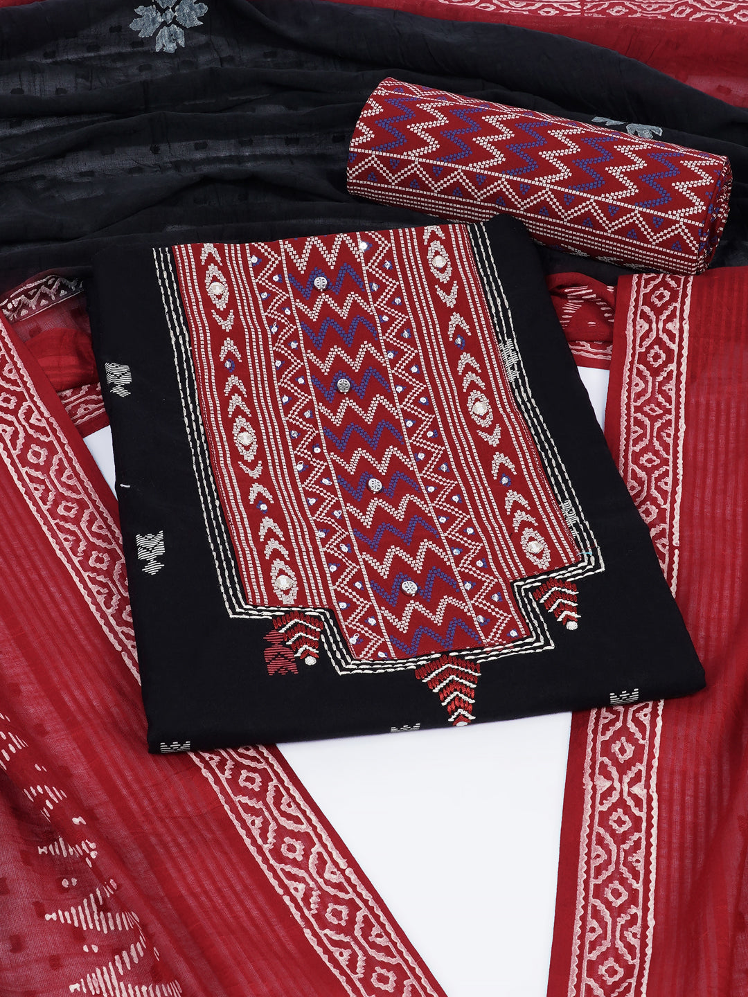 3-piece unstitched suit set featuring a butti-printed kurta with coordinated yoke detailing.