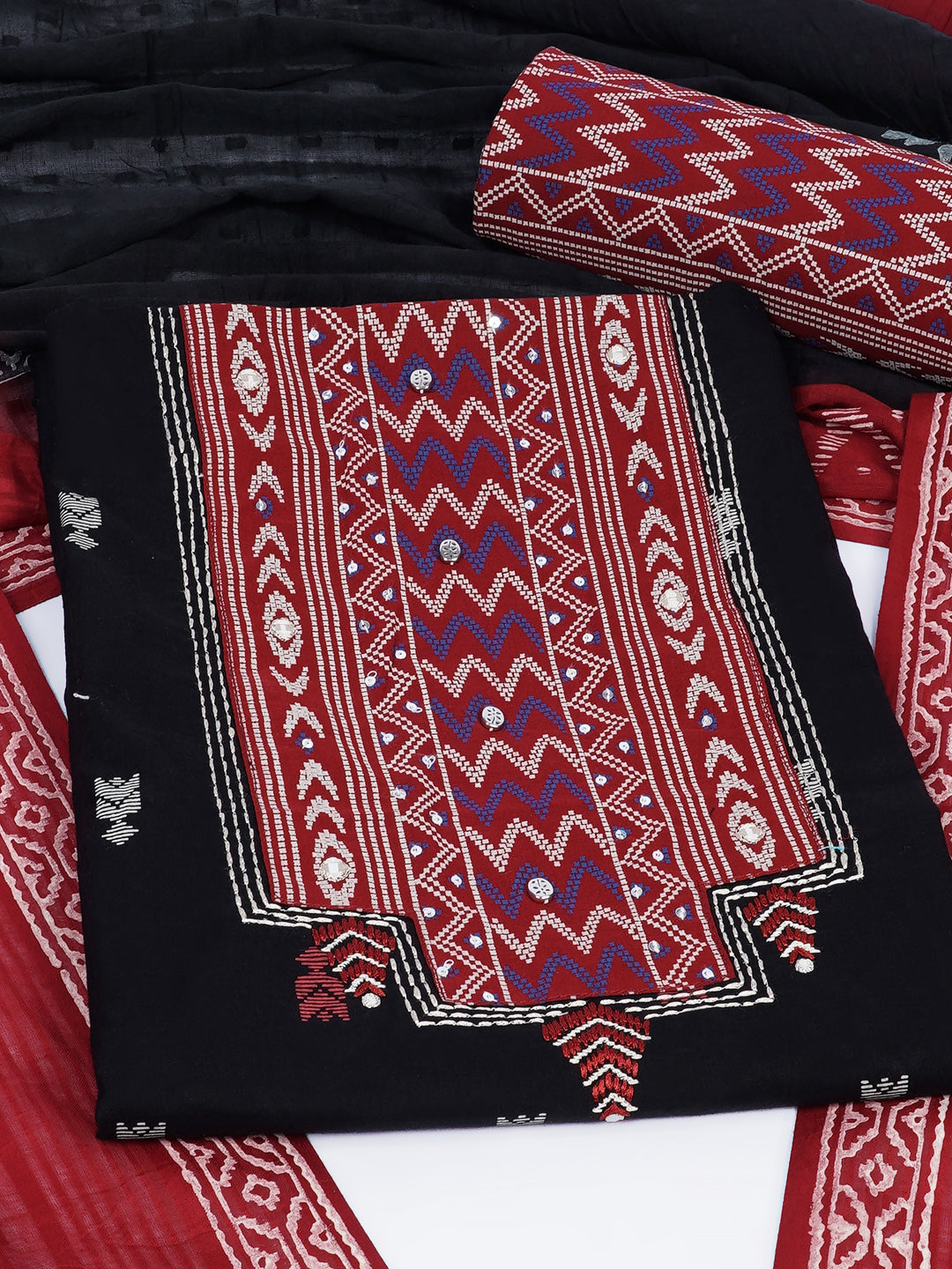 3-piece unstitched suit set featuring a butti-printed kurta with coordinated yoke detailing.