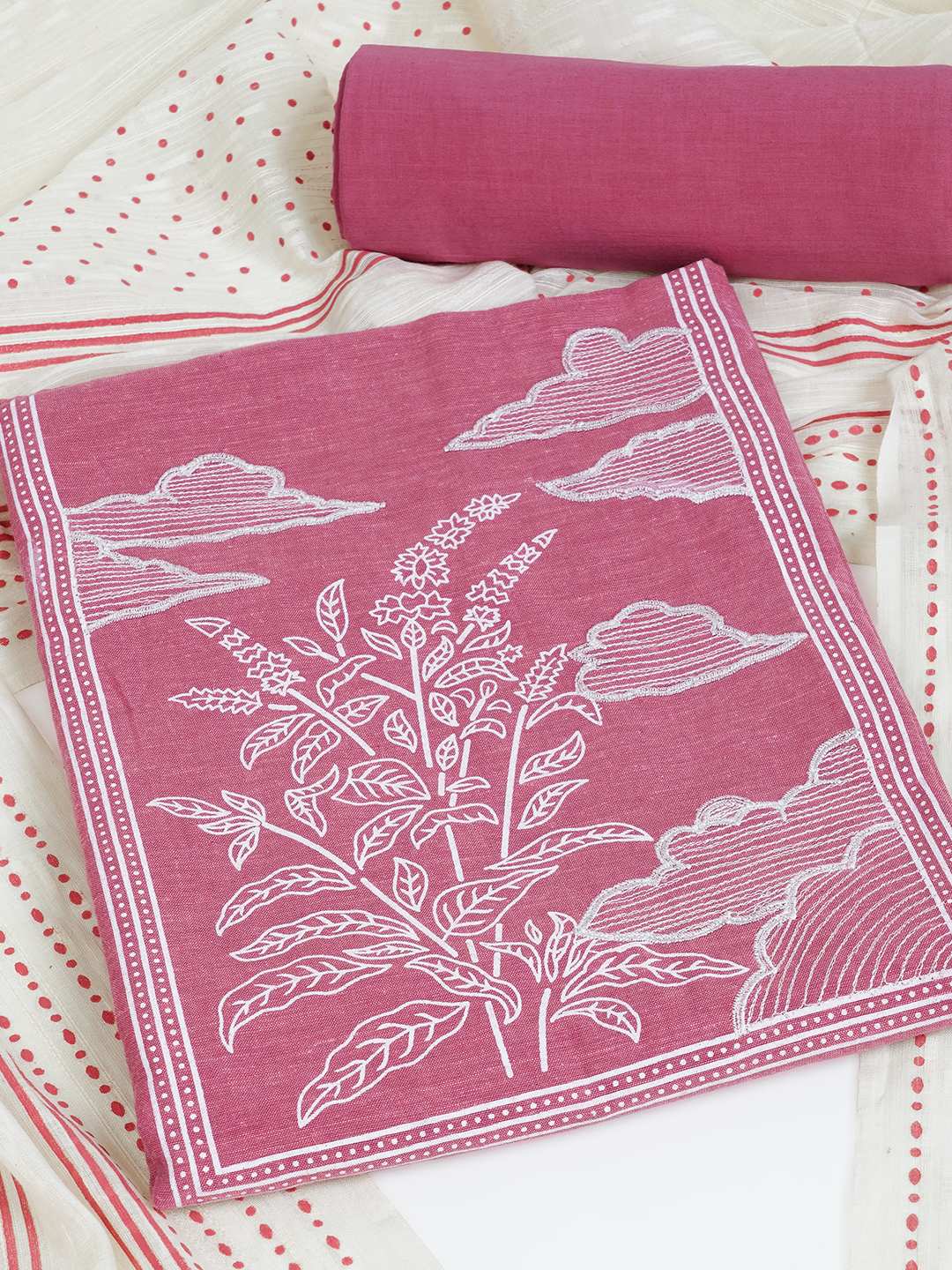 A 3-piece kurta set features a solid kurta adorned with a block-printed yoke and intricate embroidery details.(Pink)