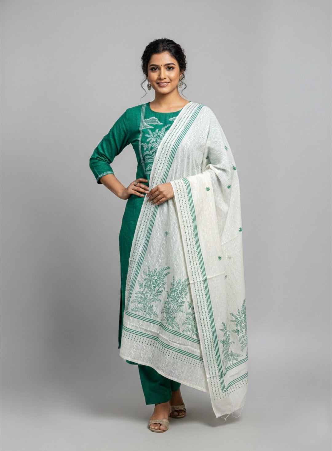 Unstitched suit set features a solid kurta adorned with a block-printed yoke and intricate embroidery details.(Blue)