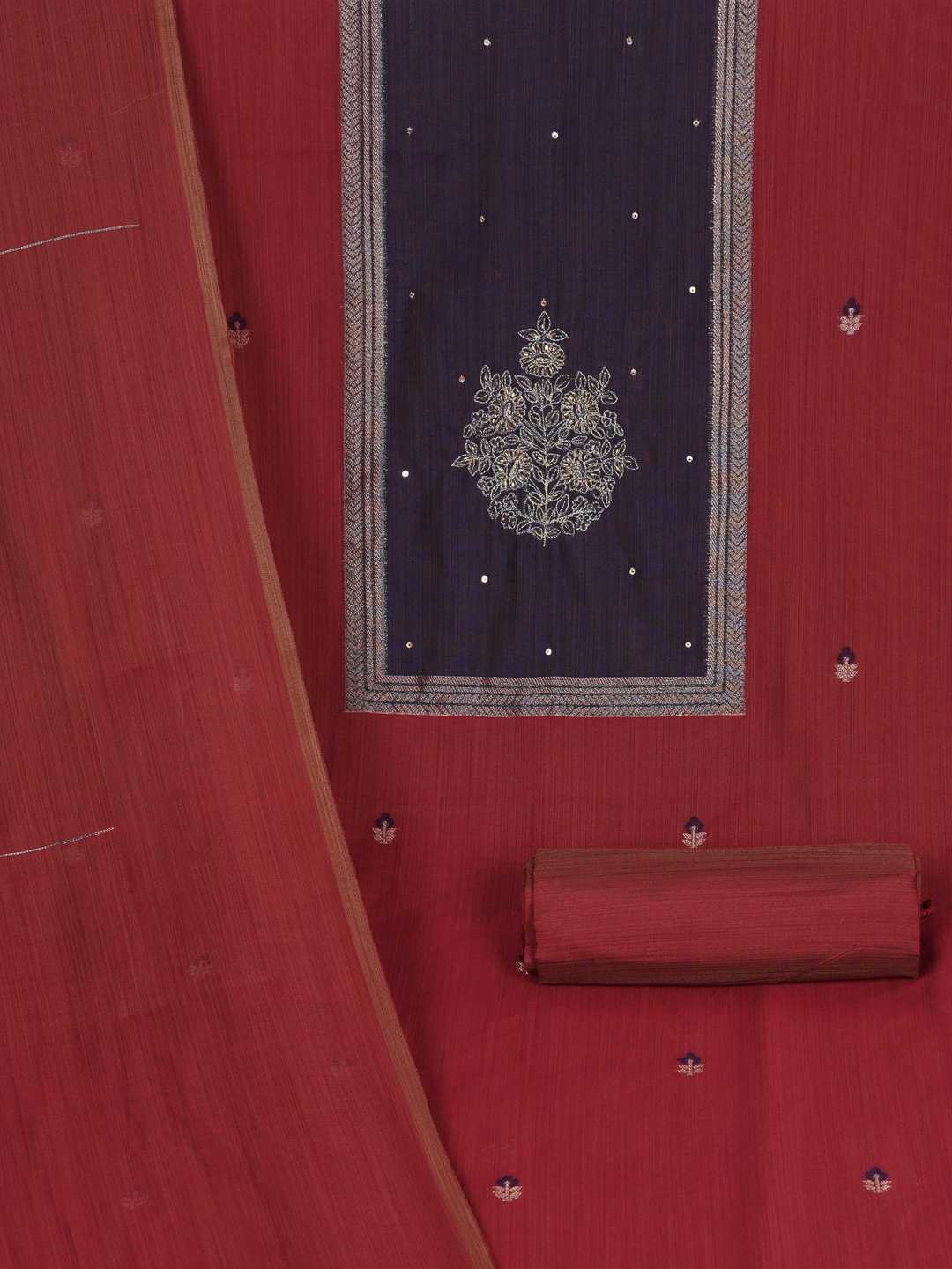 Unstitched suit set in elegant tussar silk featuring a contrast blue yoke with delicate zari work.(Maroon)