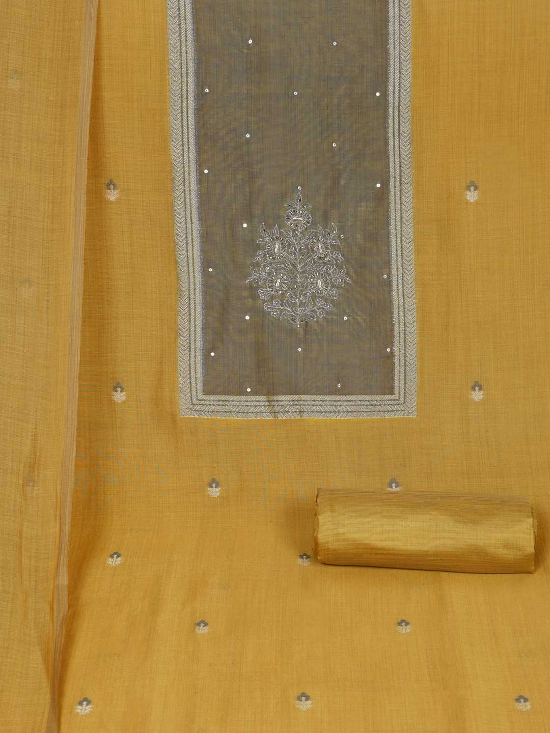 Unstitched suit set in elegant tussar silk featuring a contrast blue yoke with delicate zari work.(Yellow)