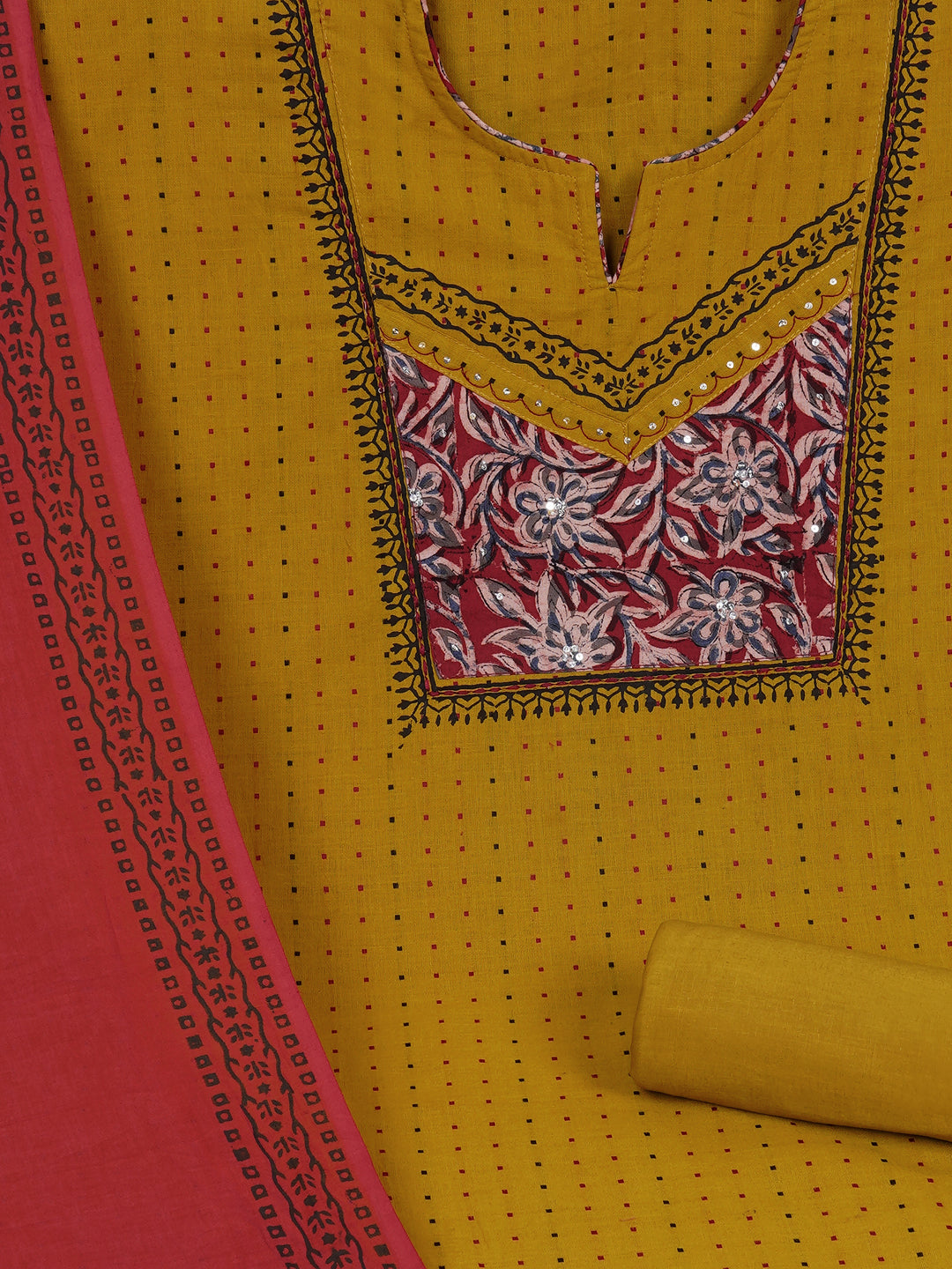 Unstitched suit set crafted in dobby fabric features a handcrafted Kalamkari printed patch.