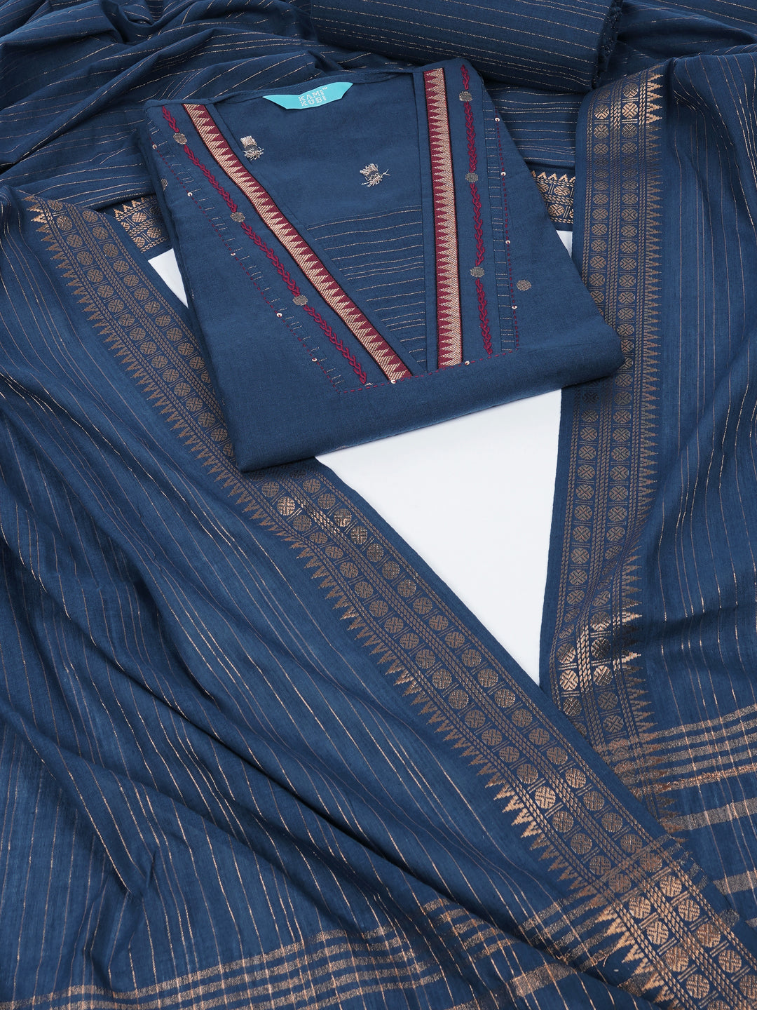 Unstitched suit set with zari dot embellished top paired with a zari striped bottom and dupatta.