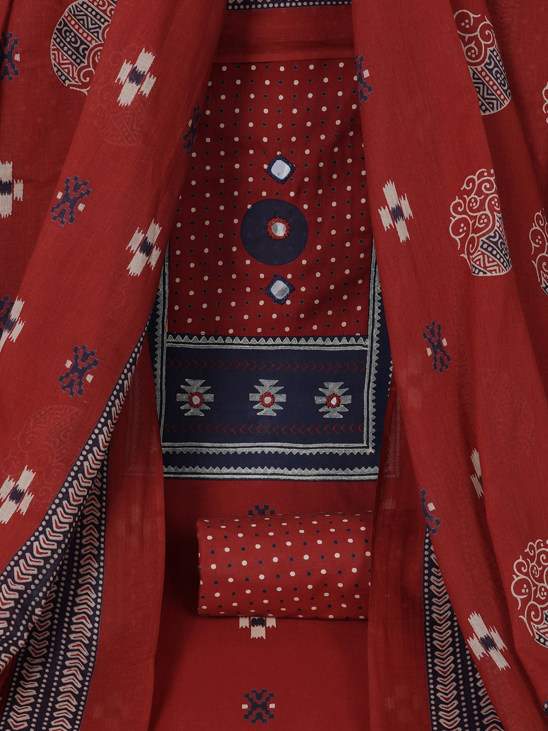 Unstitched suit set featuring a contrast yoke crafted in block print fabric and delicate handwork.