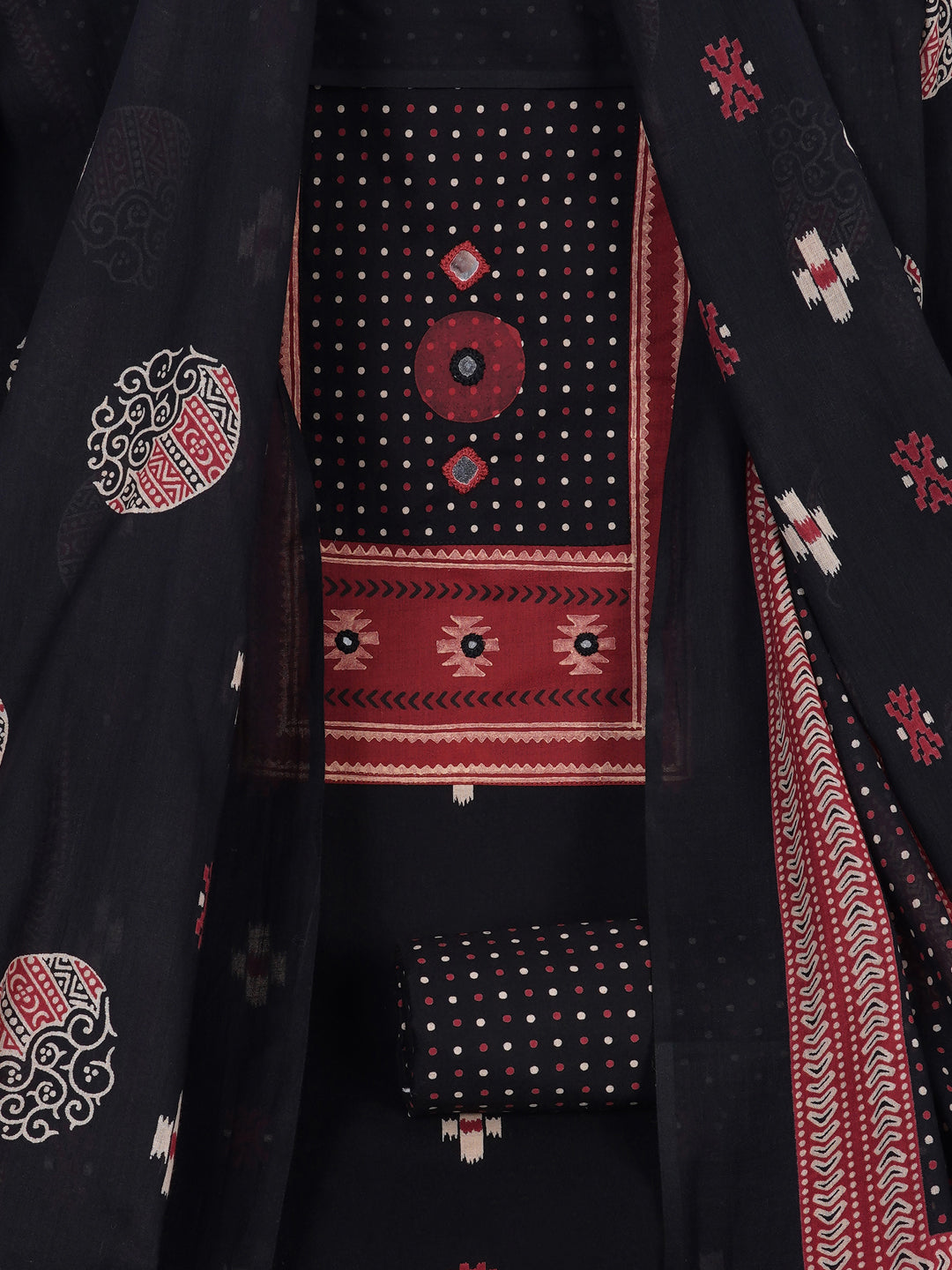 Unstitched suit set featuring a contrast yoke crafted in block print fabric and delicate handwork.