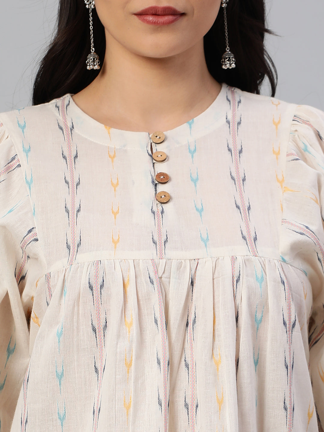 Flared cotton top with gathering detail on sleeve