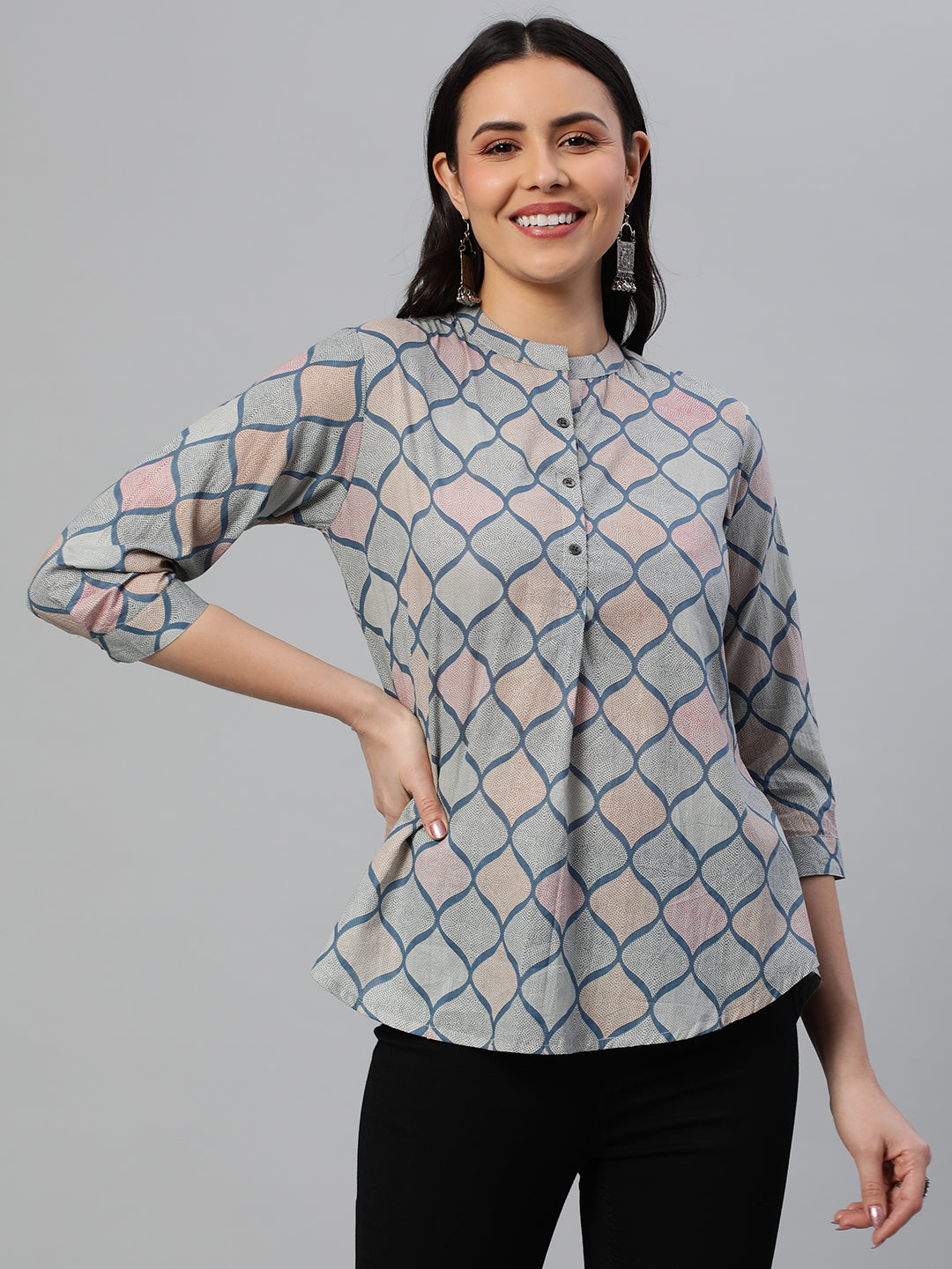 Flared printed cotton top with stand collar, knife pleat and button detailing
